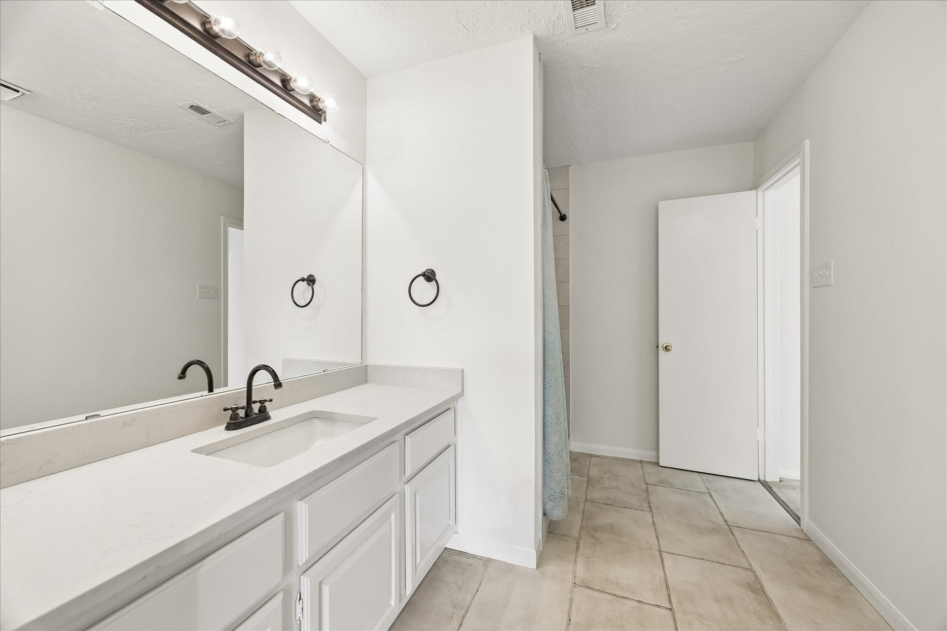 3806 Crystal Falls Drive, Missouri City, TX 77459 Bright vanity area offers generous counter space and storage in the upstairs second primary bath.