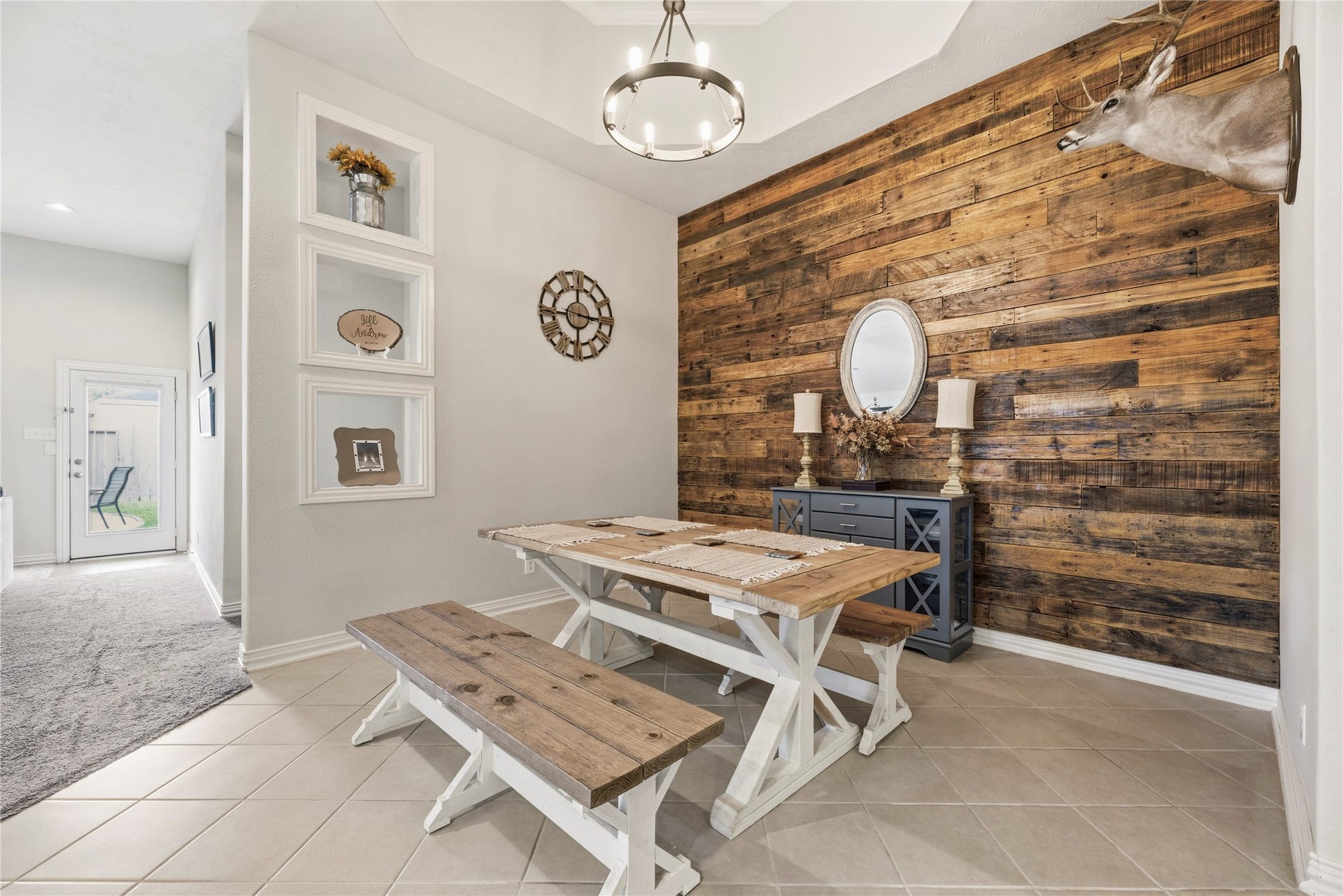 16014 Mark Crest Drive, Hockley, TX 77447 Stunning dining area with a striking wood accent wall.