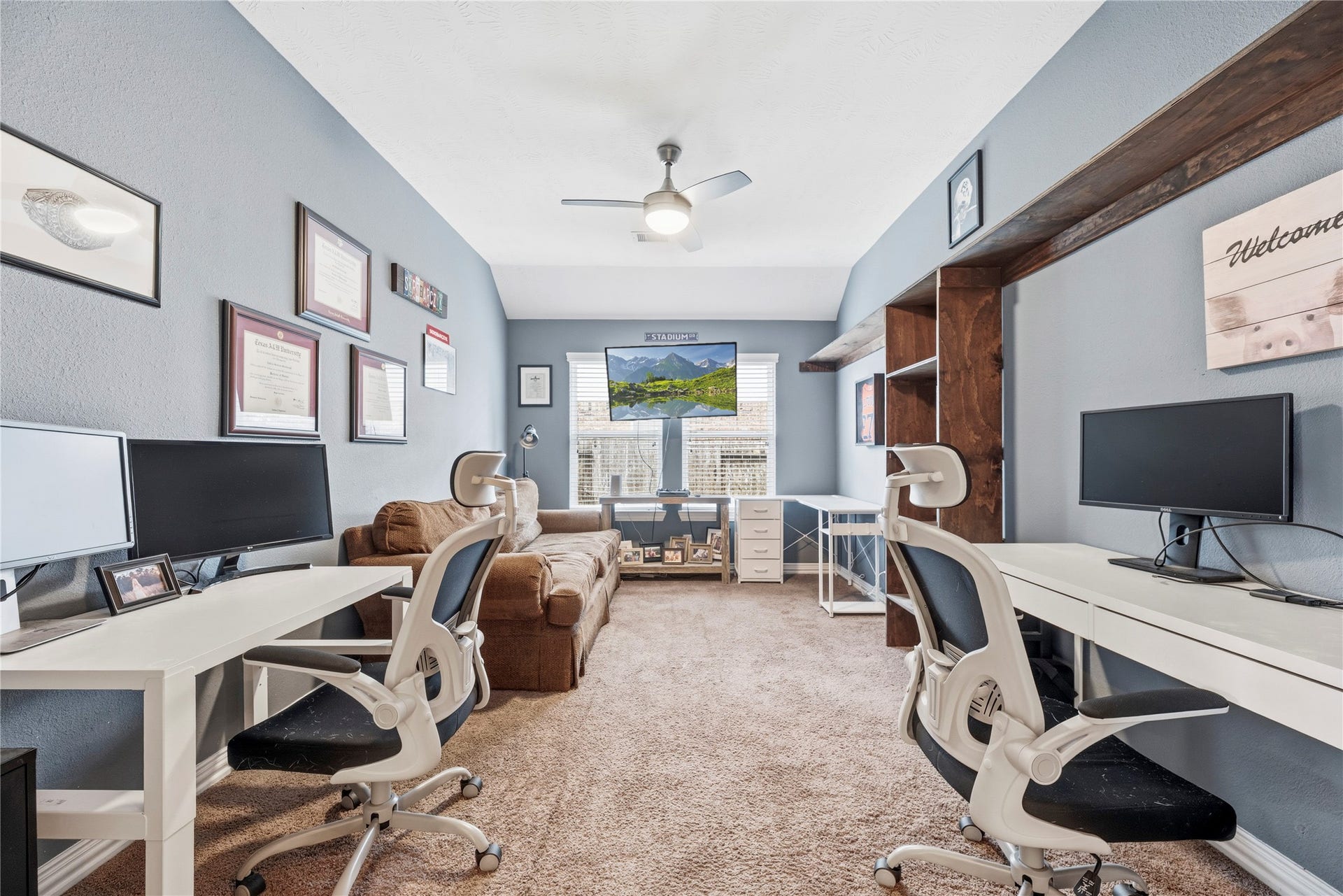 16014 Mark Crest Drive, Hockley, TX 77447 Barn doors lead to a private home office.