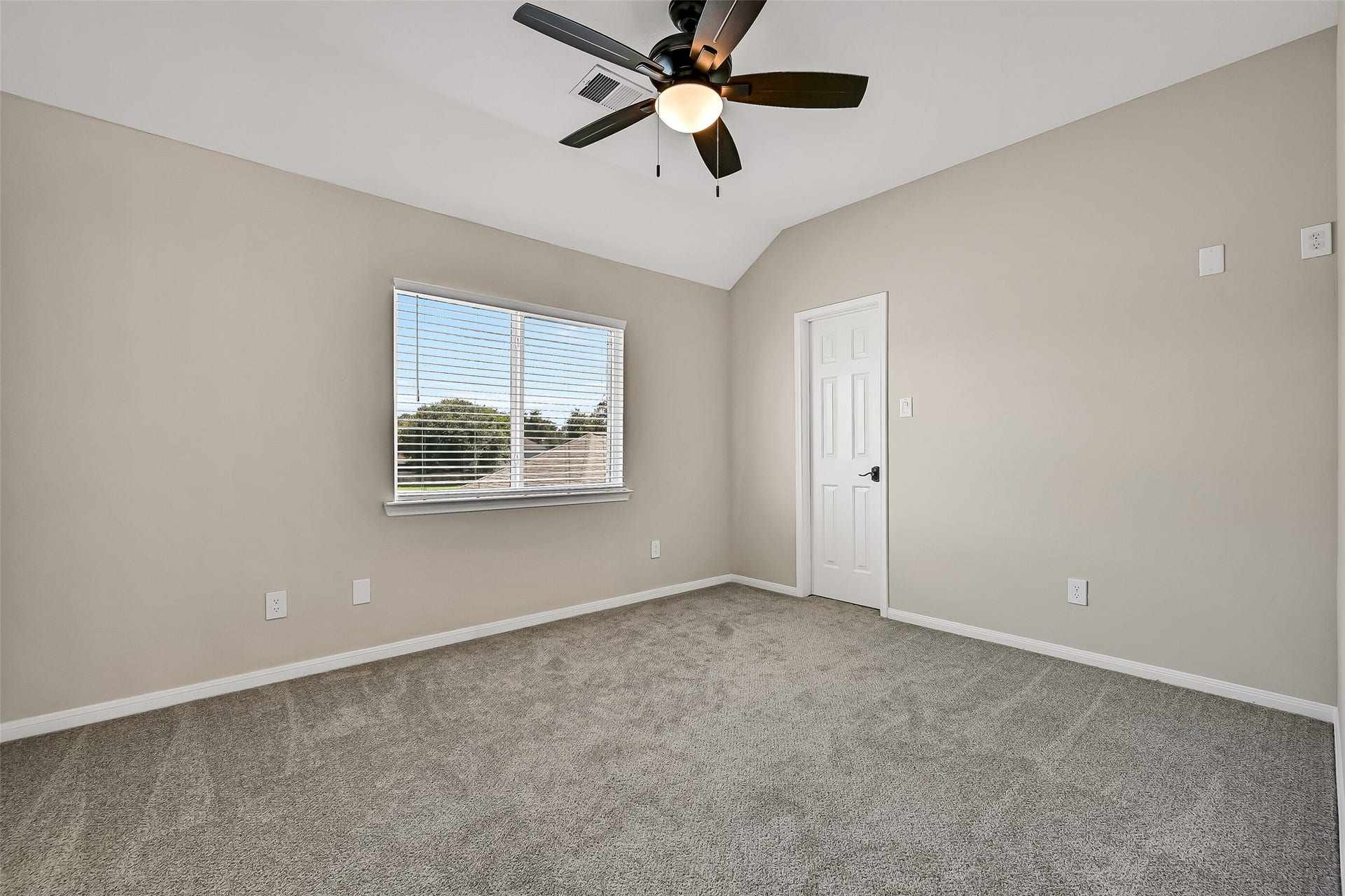 2505 Sarasota Drive, Friendswood, TX 77546 The third upstairs bedroom is another bright, comfortably sized space with neutral carpet, ceiling fan, and a walk-in closet. With three bedrooms, two full baths and a gameroom upstairs, the floor plan offers excellent separation from the primary suite.