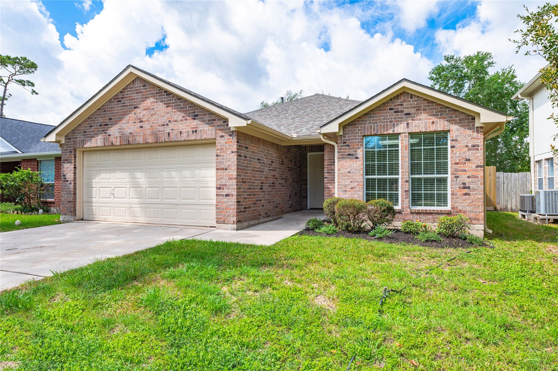 4337 Country Club Drive, Dickinson, TX 77539 New roof in 9/2026 , landscape beds and walkway to covered front porch.