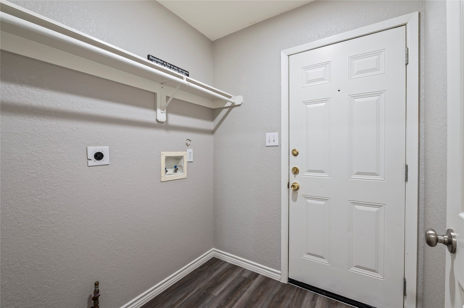4337 Country Club Drive, Dickinson, TX 77539 Utility room in house with garage access.