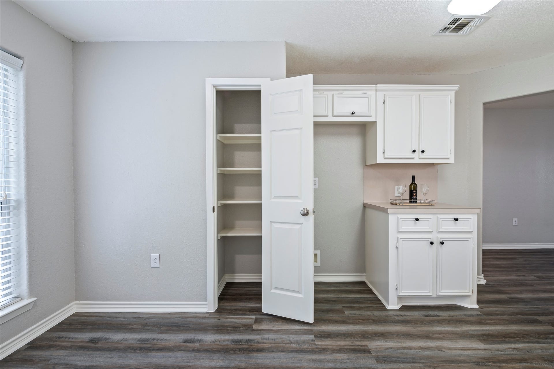 4337 Country Club Drive, Dickinson, TX 77539 Pantry area in the kitchen with built in shelving.