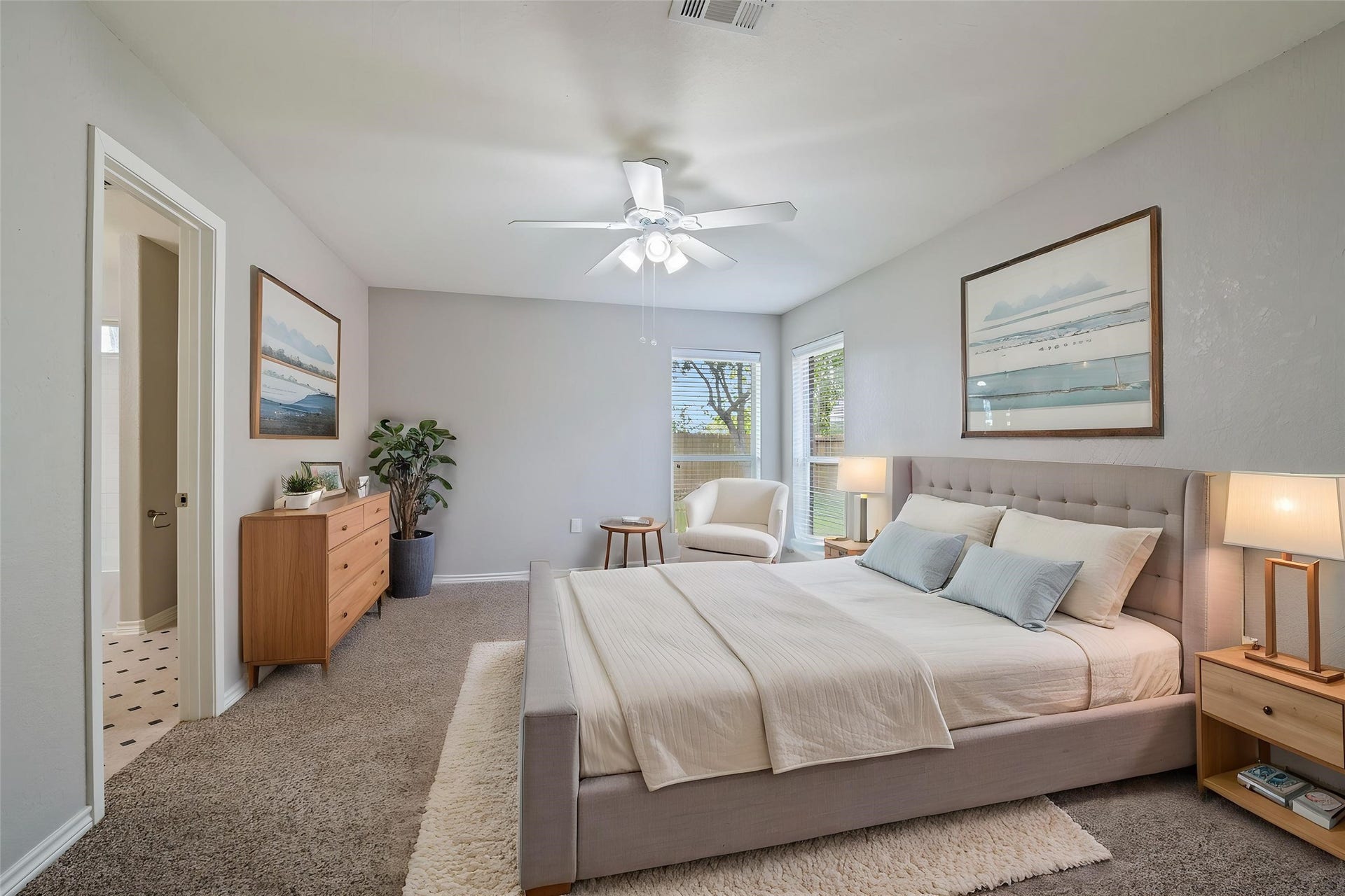 4337 Country Club Drive, Dickinson, TX 77539 Primary bedroom is very spacious with backyard views. Virtually staged.