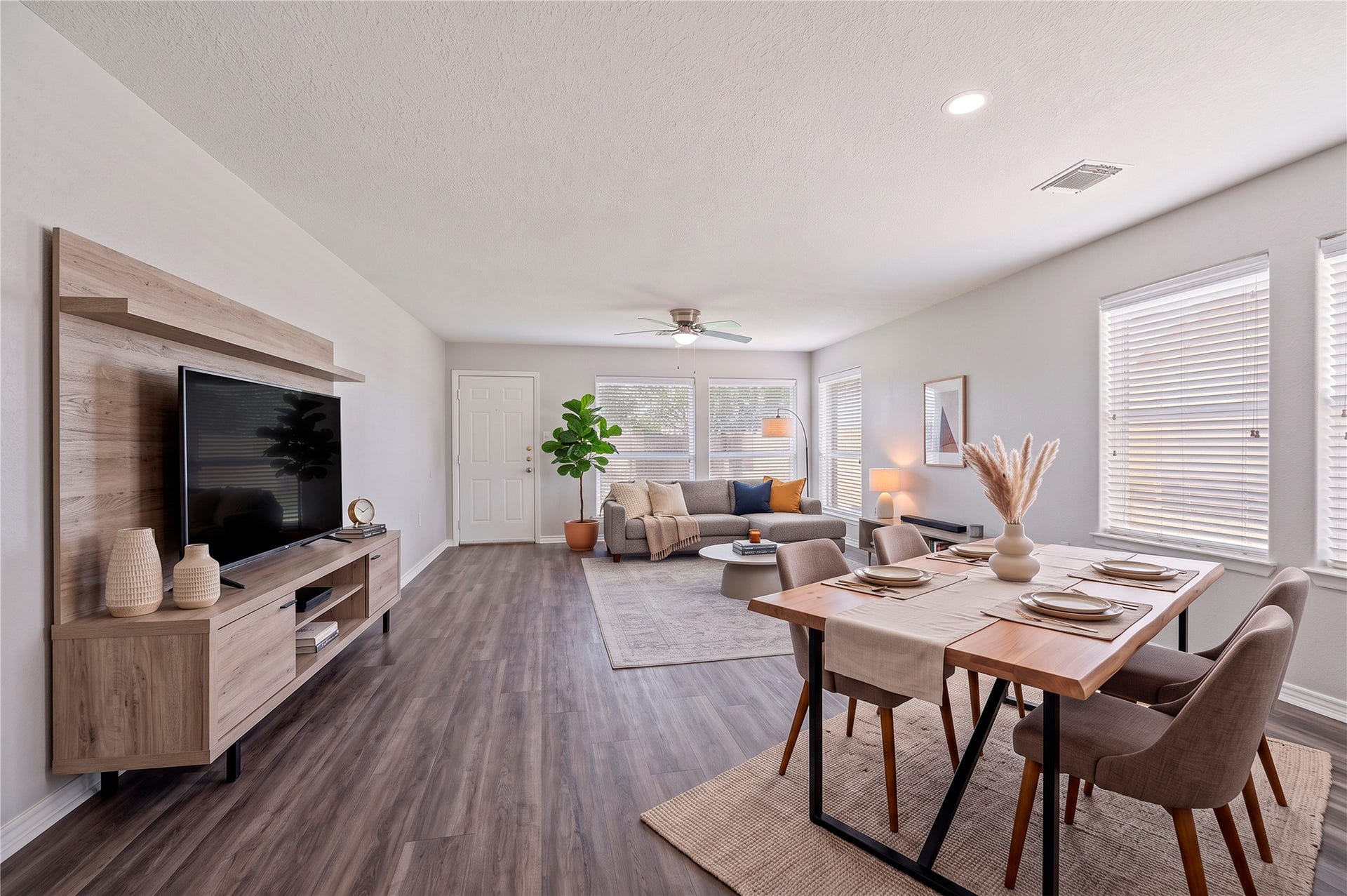 4337 Country Club Drive, Dickinson, TX 77539 Virtually staged living room/dining space to image the possibilities.