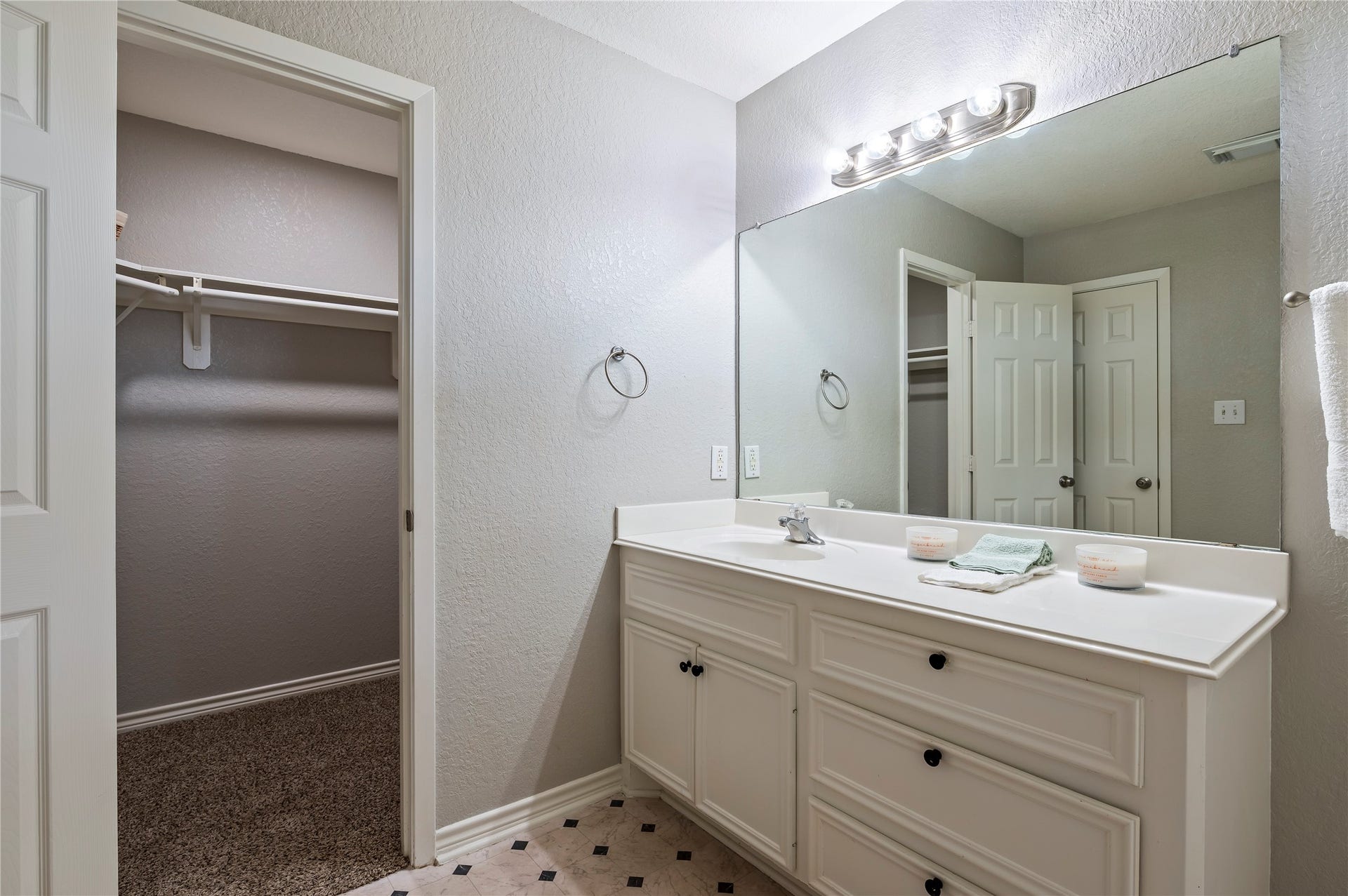 4337 Country Club Drive, Dickinson, TX 77539 Another view of the primary bath vanity and walk in closet.