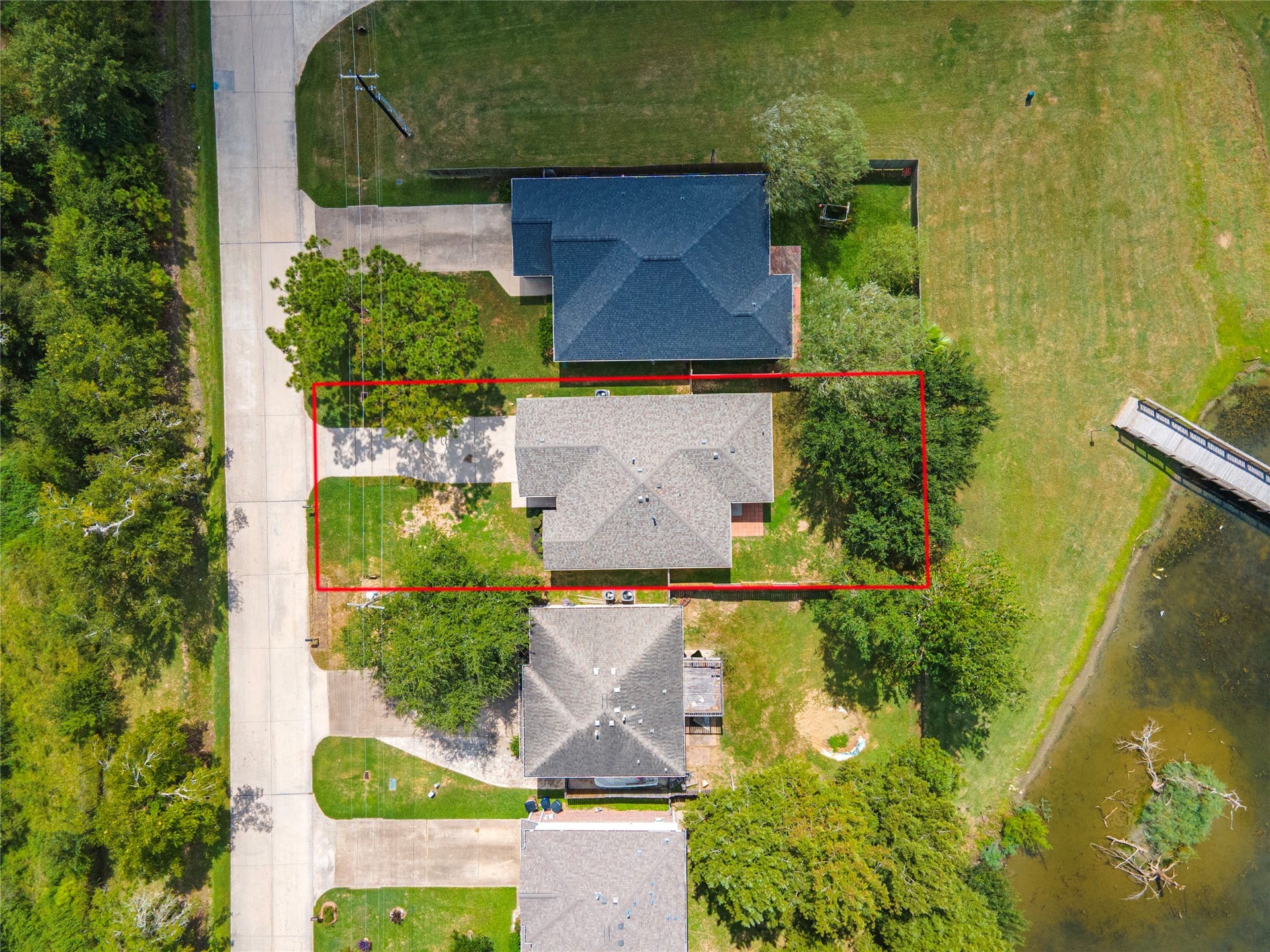 4337 Country Club Drive, Dickinson, TX 77539 Aerial view of the home with no back or front neighbors.