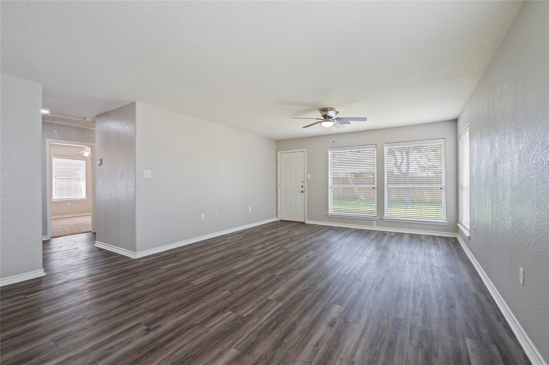 4337 Country Club Drive, Dickinson, TX 77539 Open concept living room and dining space.