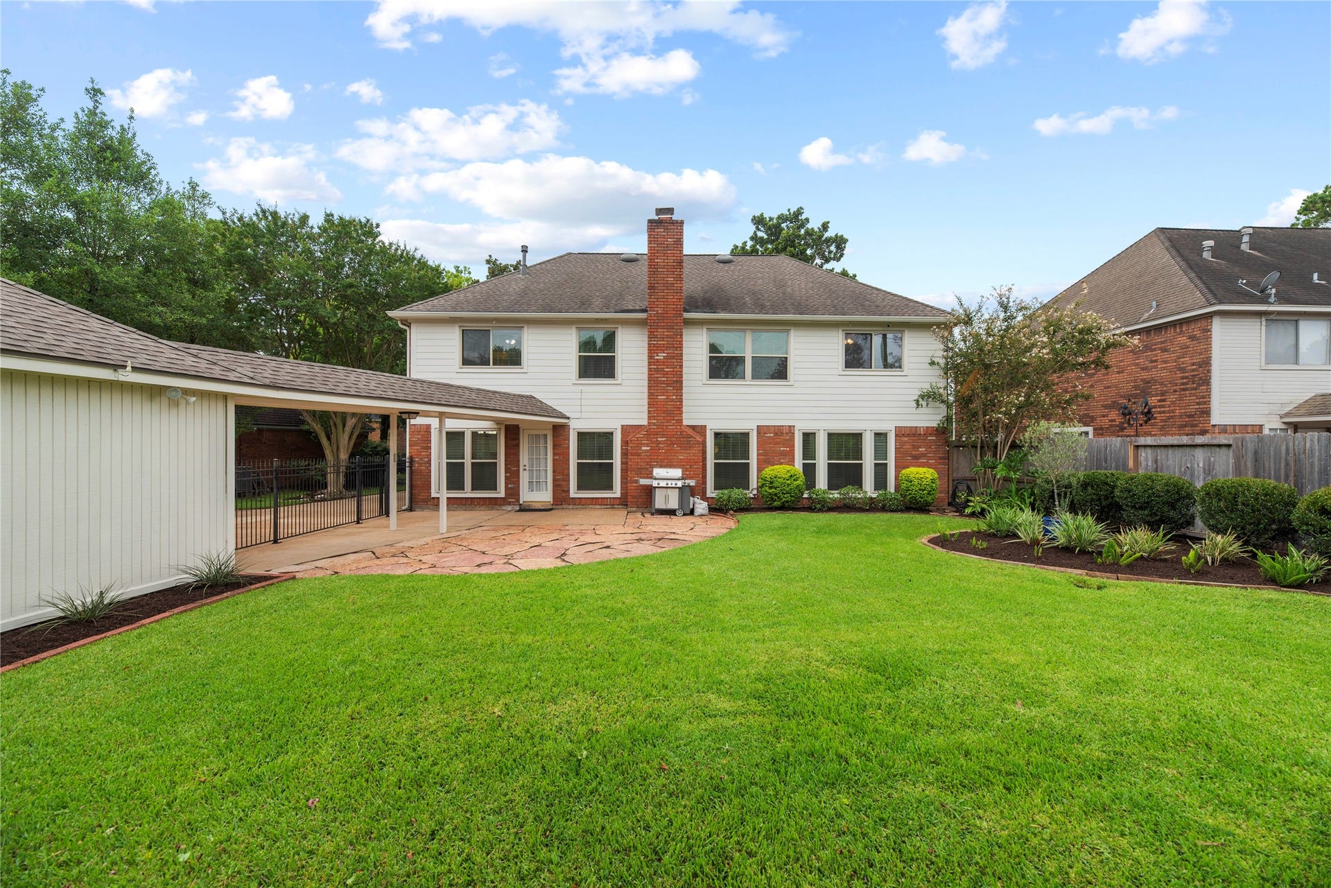 7426 Foxton Place Court, Houston, TX 77095 Step outside to a fully fenced backyard with mature landscaping, an expansive flagstone patio, privacy fence and a full sprinkler system in both the front and back to help keep everything looking its best.