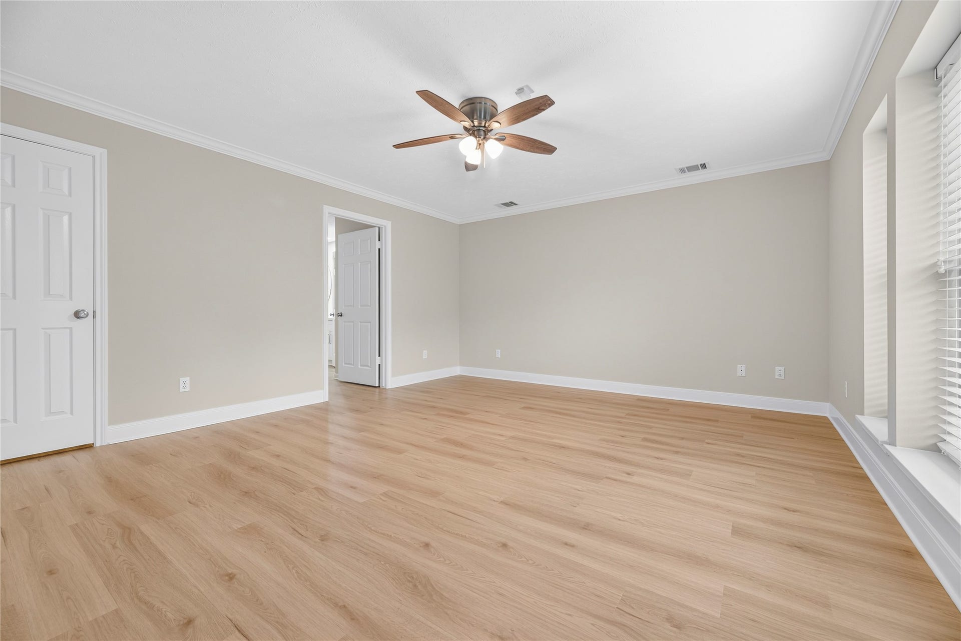 7426 Foxton Place Court, Houston, TX 77095 The owners suite offers a calm, comfortable place to begin and end each day, complete with updated LVP flooring, fresh neutral paint, updated windows and plenty of natural light. With 3 walk-in closets and a luxurious updated ensuite bathroom, storage and style are equally impressive.