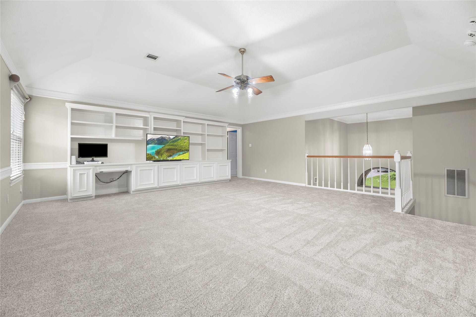 7426 Foxton Place Court, Houston, TX 77095 It is all fun and games upstairs in this super-sized game room, where neutral paint, updated carpet installed in July 2026, updated windows and a raised ceiling create a bright, comfortable space for everyone to relax or play.