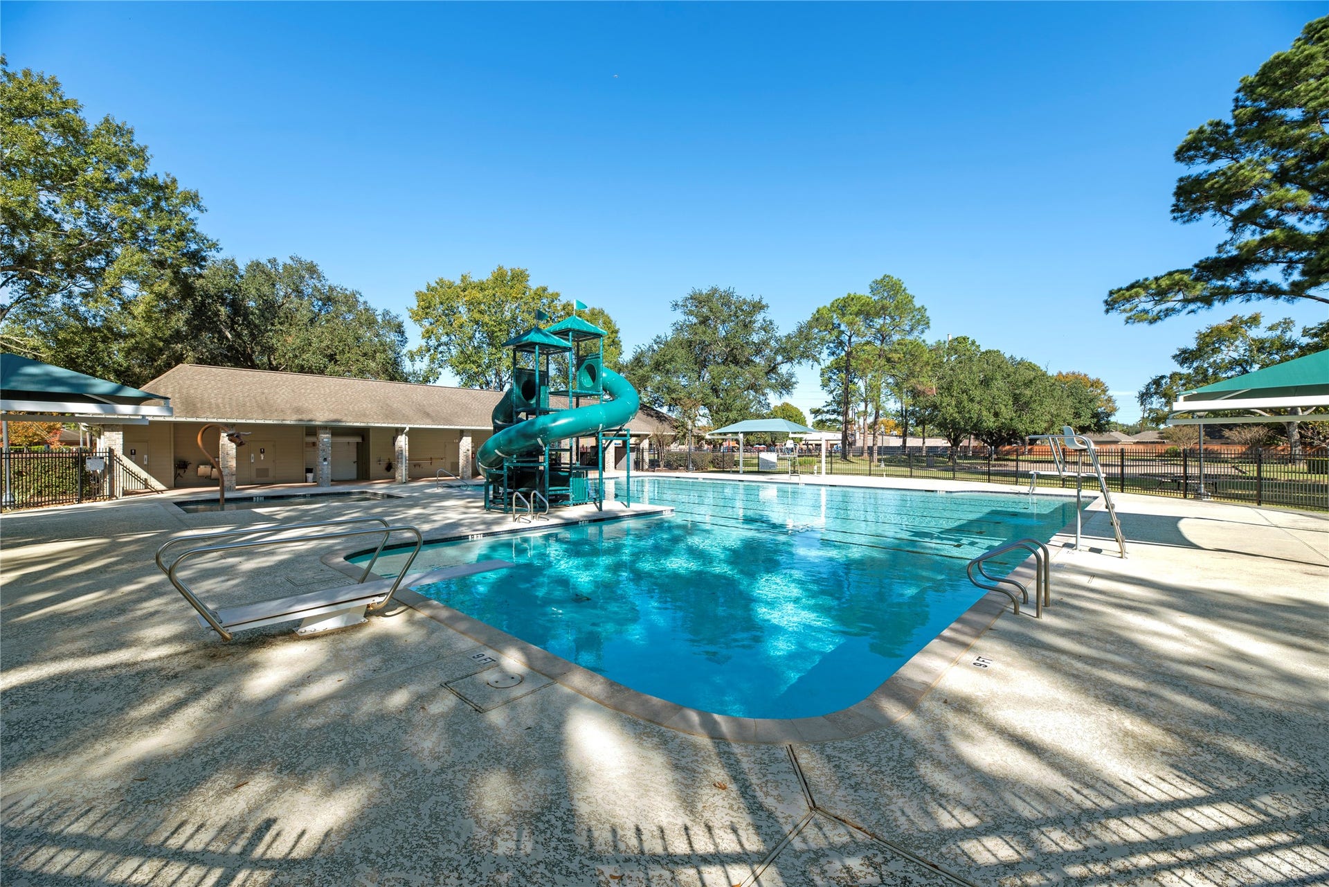 7426 Foxton Place Court, Houston, TX 77095 Cool off, make a splash & enjoy sunny afternoons at the Southdown Village neighborhood pool, complete with a fun waterslide for added excitement.