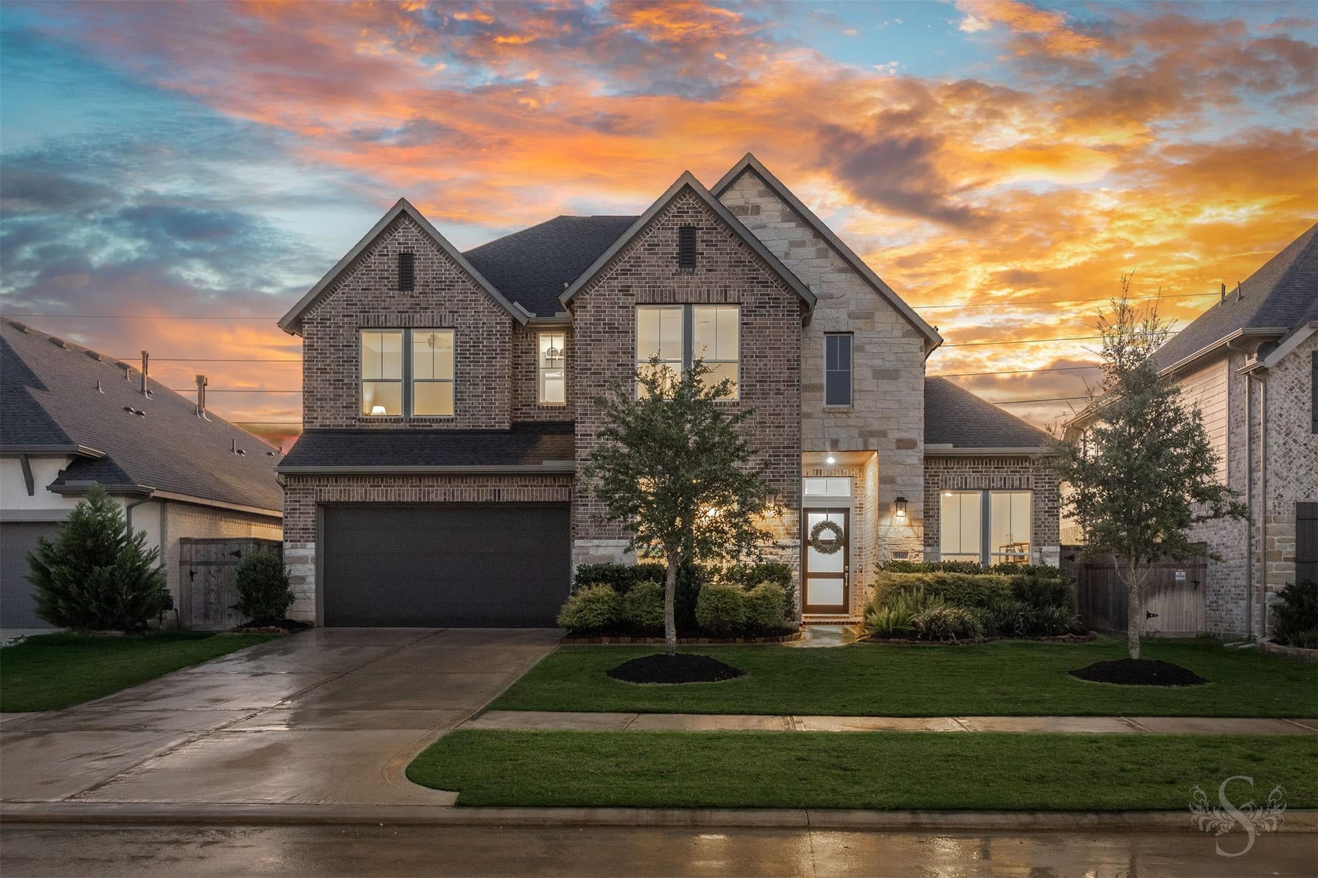 This exceptional 4 bedroom, 3.5 bath, 3 car garage home in Cross Creek Ranch showcases striking brick and stone architecture with impressive curb appeal. A modern front door and manicured landscaping beautifully complete the exterior.