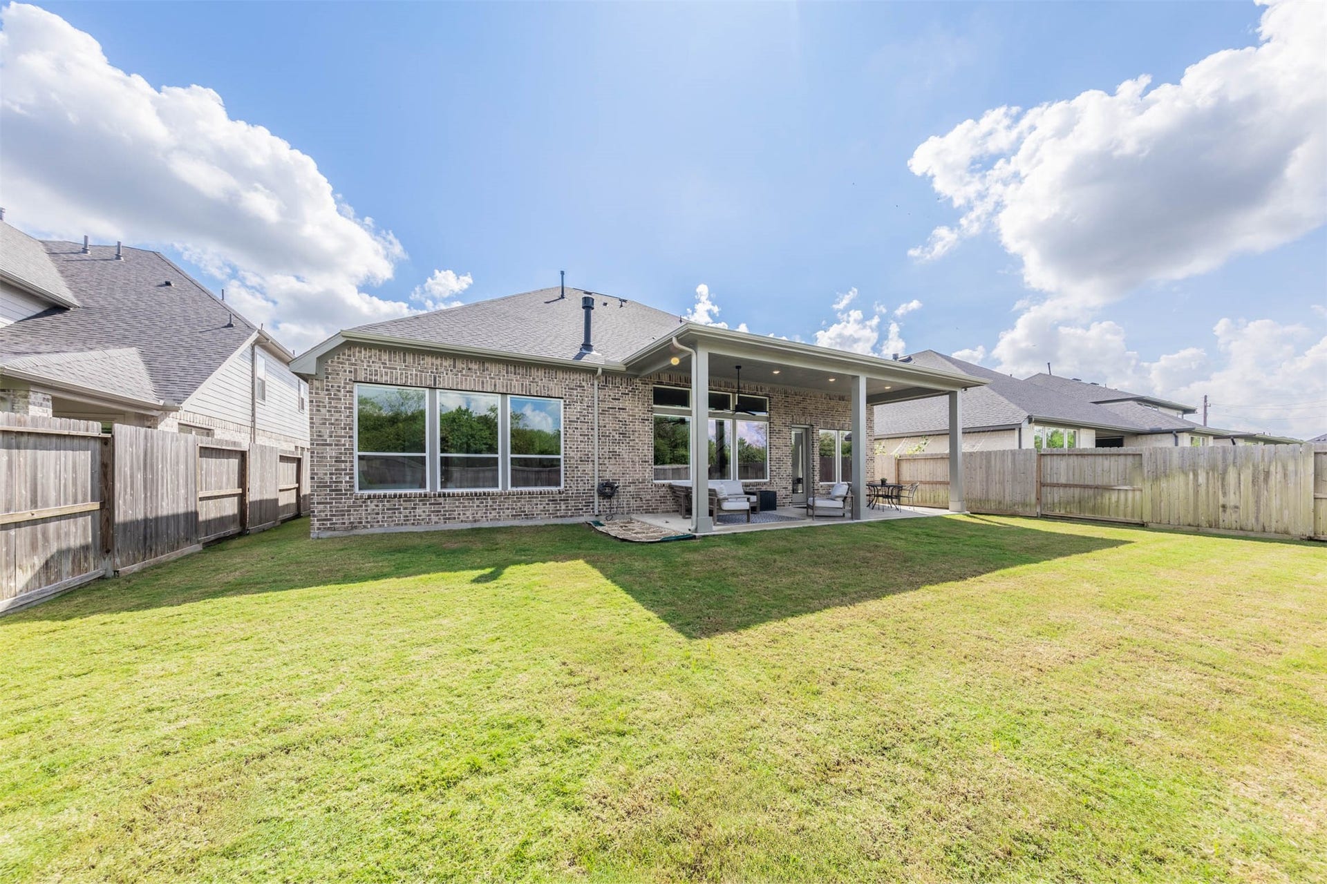Expansive backyard offers exceptional space for outdoor recreation, entertaining and enjoying the beautiful Texas weather. Its desirable greenbelt setting provides a lush backdrop and added privacy.