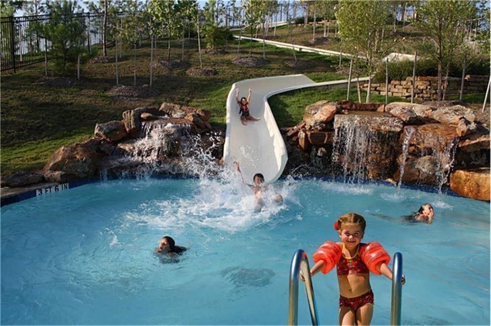 Experience the fun! Take a thrilling ride down the 140-foot winding slide and splash into the refreshing pool surrounded by natural rock waterfalls. This is just one of the incredible amenities waiting for you in Cross Creek Ranch!