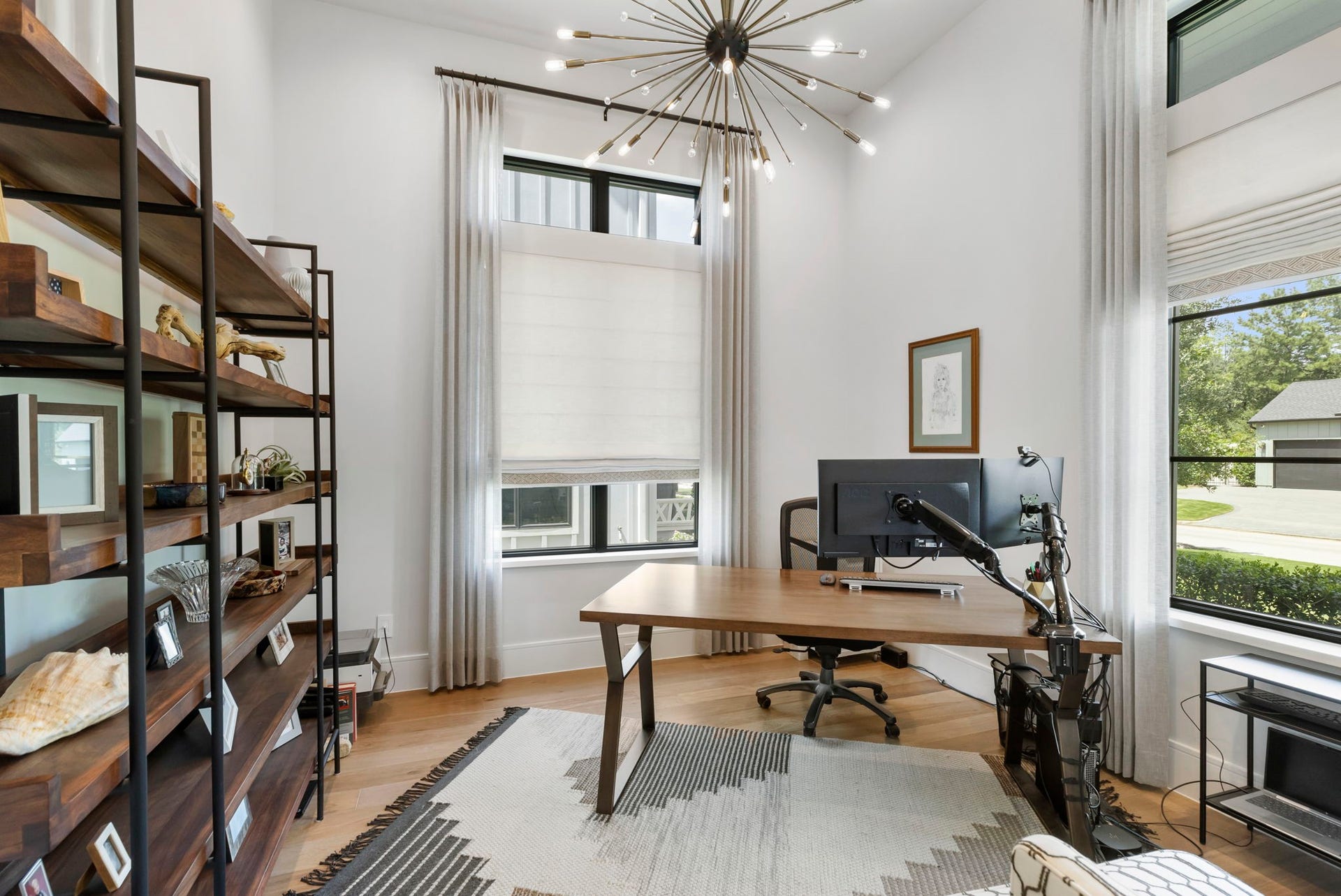 Upon entering, the formal study is on your right, boasting a high ceiling and views of the front landscape.