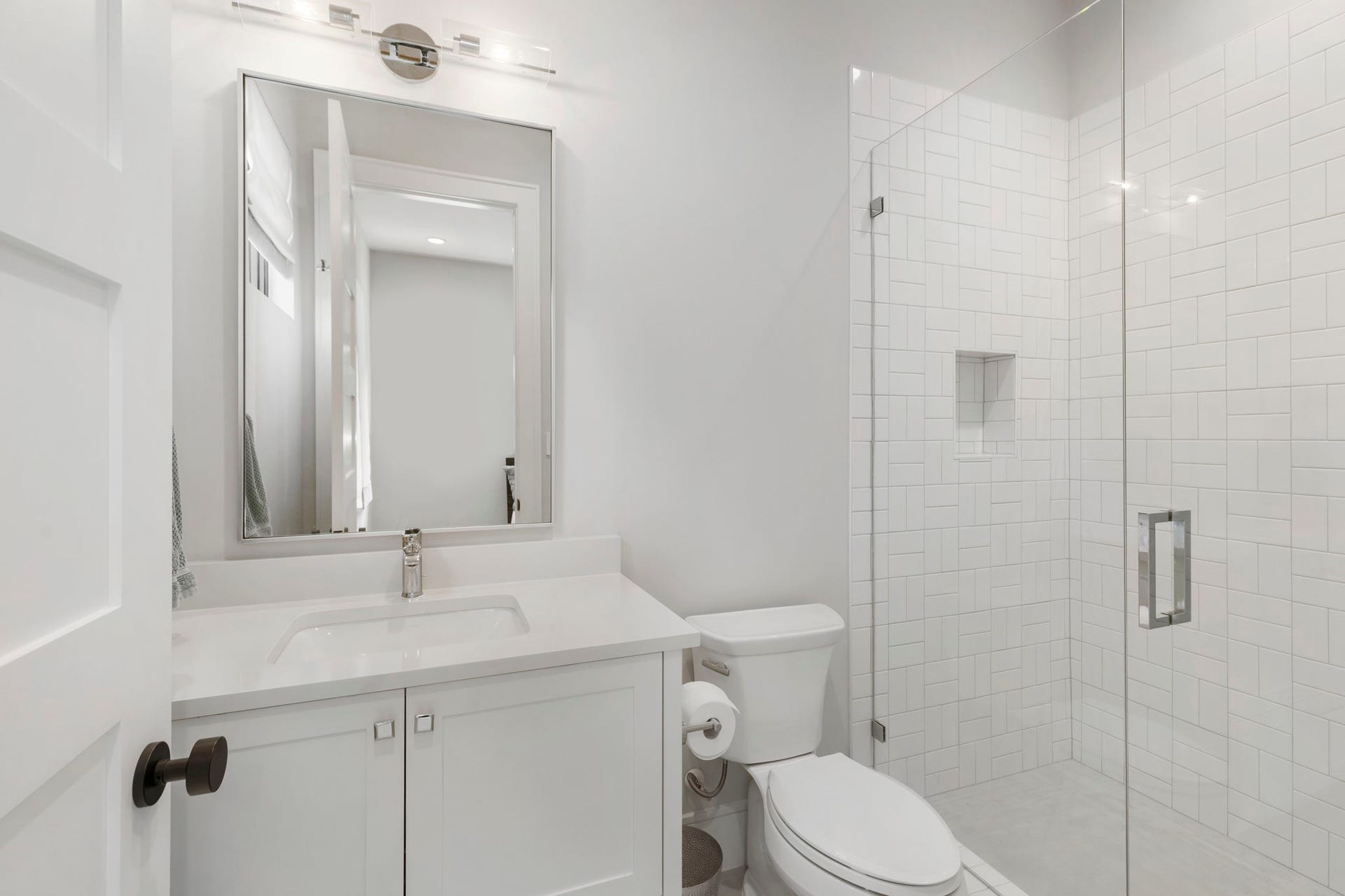 The baths feature all the expected comforts with large walk-in showers. Ensuite for Bedroom 2 pictured here.