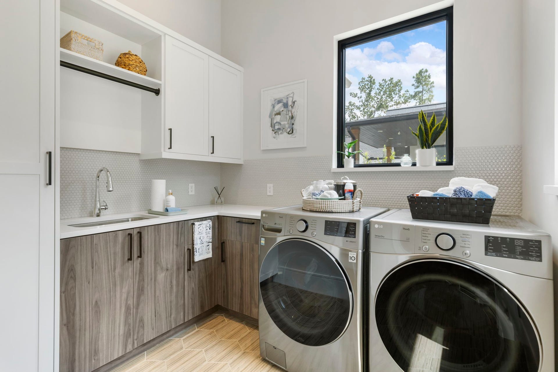 Also just off the garage and kitchen area, the utility room highlights plenty of storage and room for full size washer/dryer.