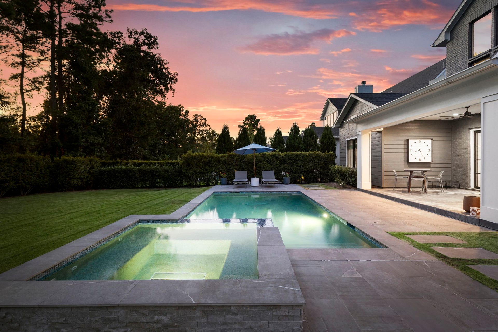 Surrounded by lush, mature trees, there is ample room for pets, play and entertaining.