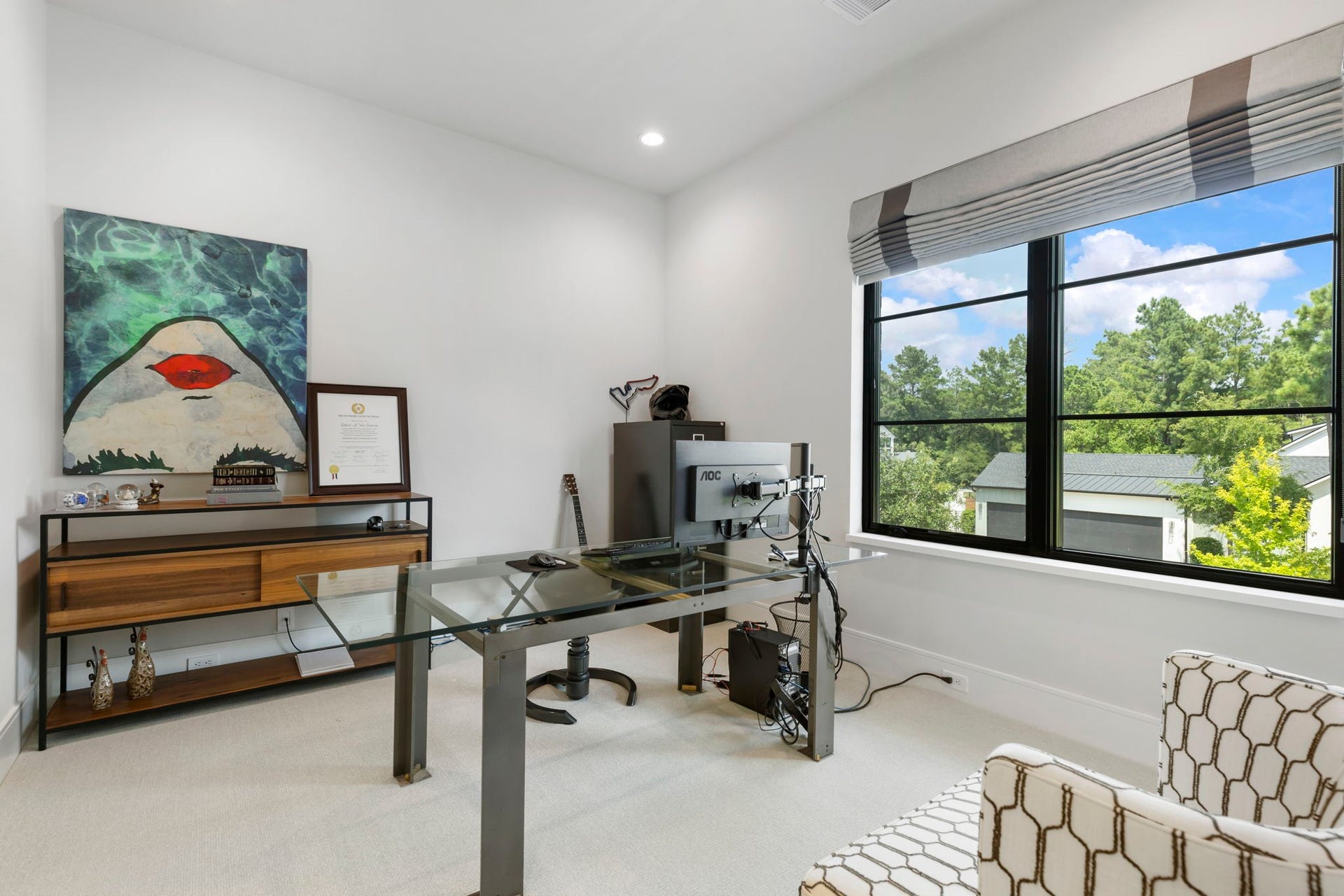Pictured here, Bedroom 1 of 3 additional bedrooms and en suite baths located on the second floor.