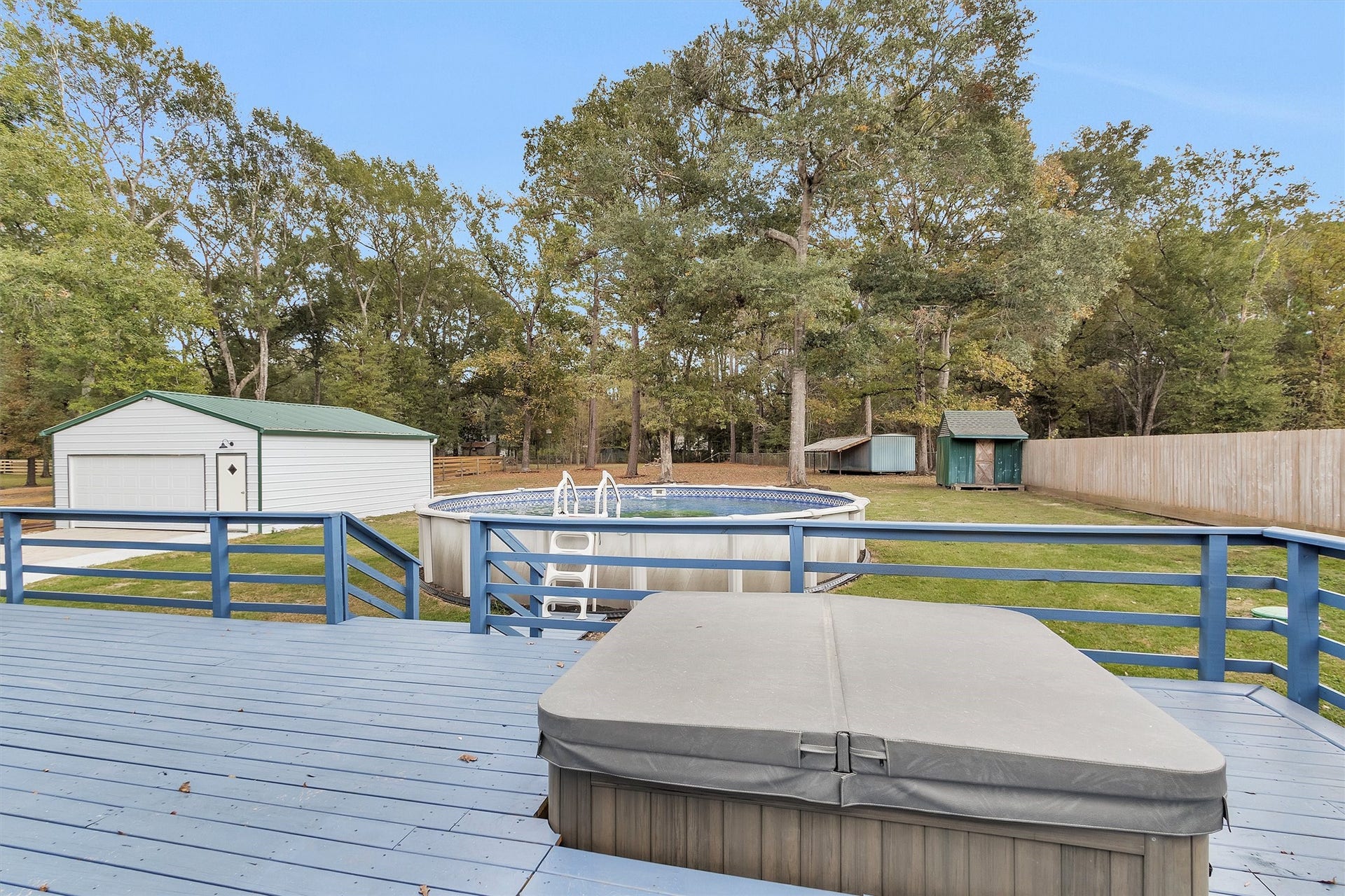 4621 Price Road, Montgomery, TX 77316 Perfect view of private pool, shop, and massive yard