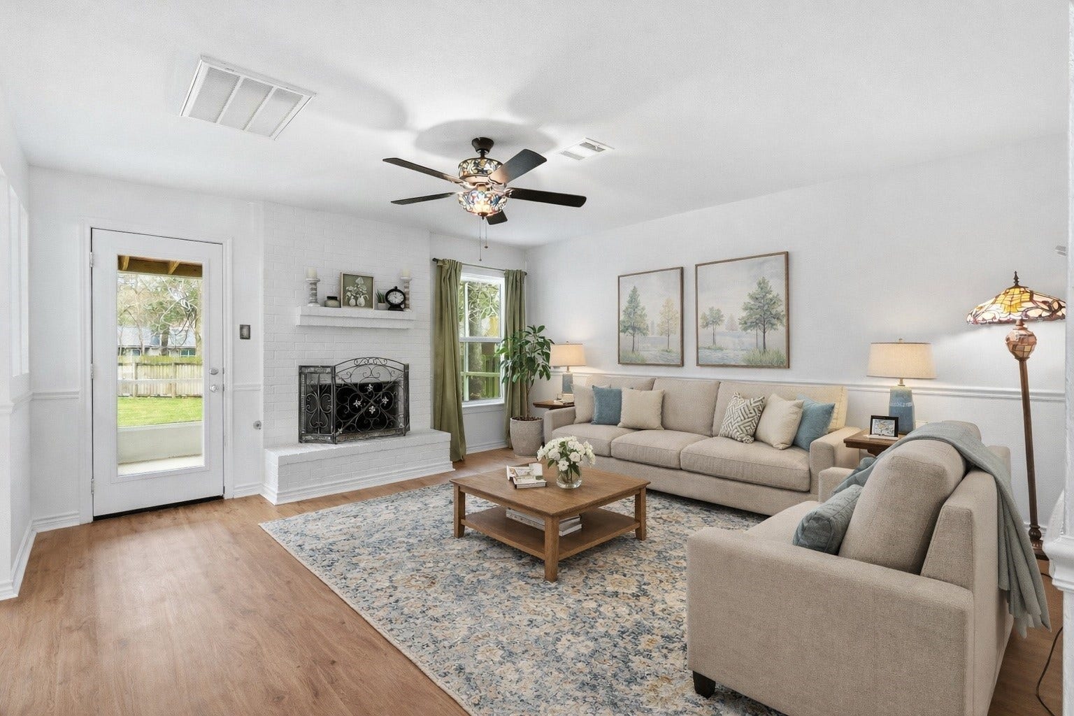 10 E Broken Oak Court, Spring, TX 77381 Virtually Staged. The beautiful stained glass ceiling fan, however, is a wonderful piece of this lovely Family Room.