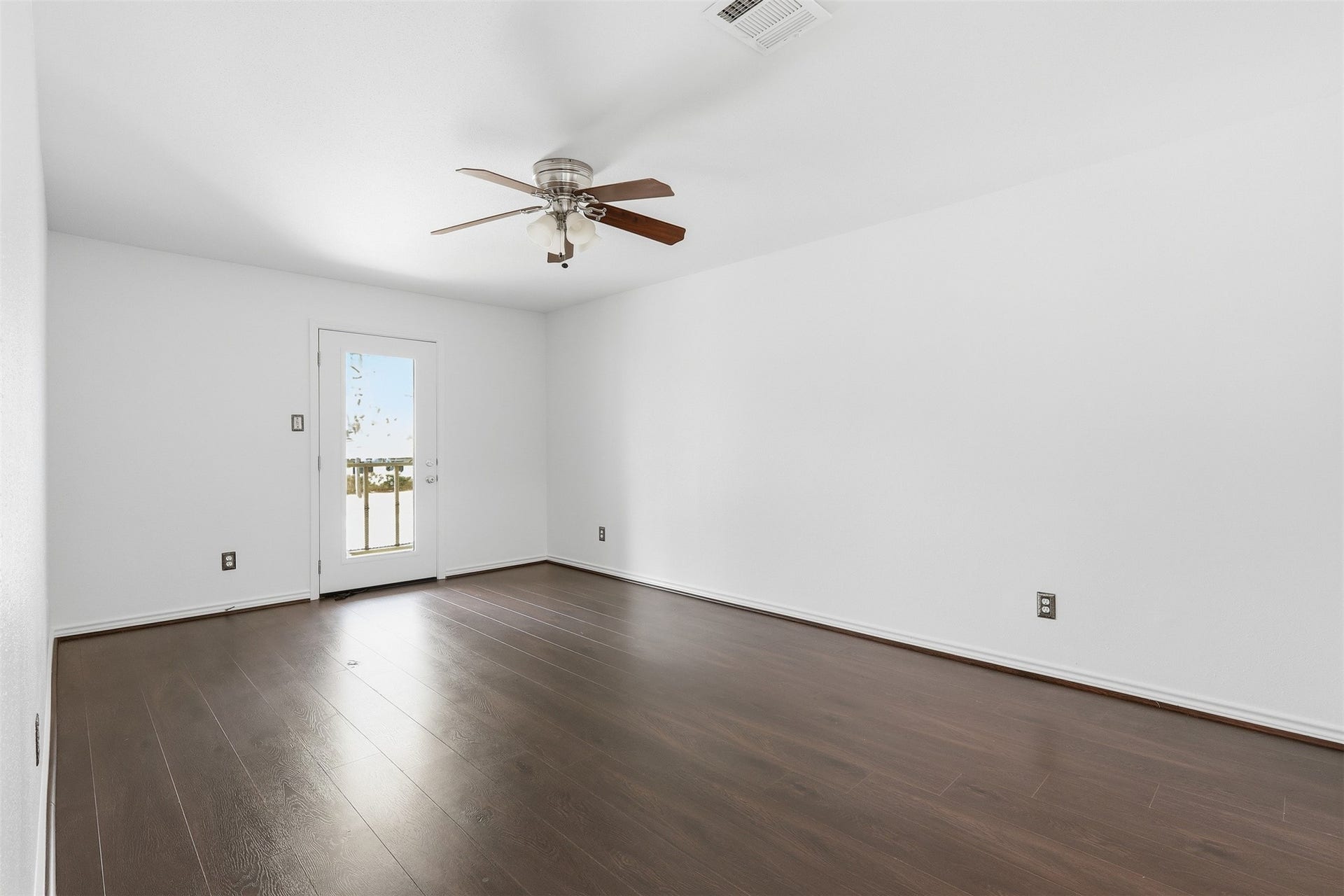 10 E Broken Oak Court, Spring, TX 77381 Primary bedroom with connected balcony access.