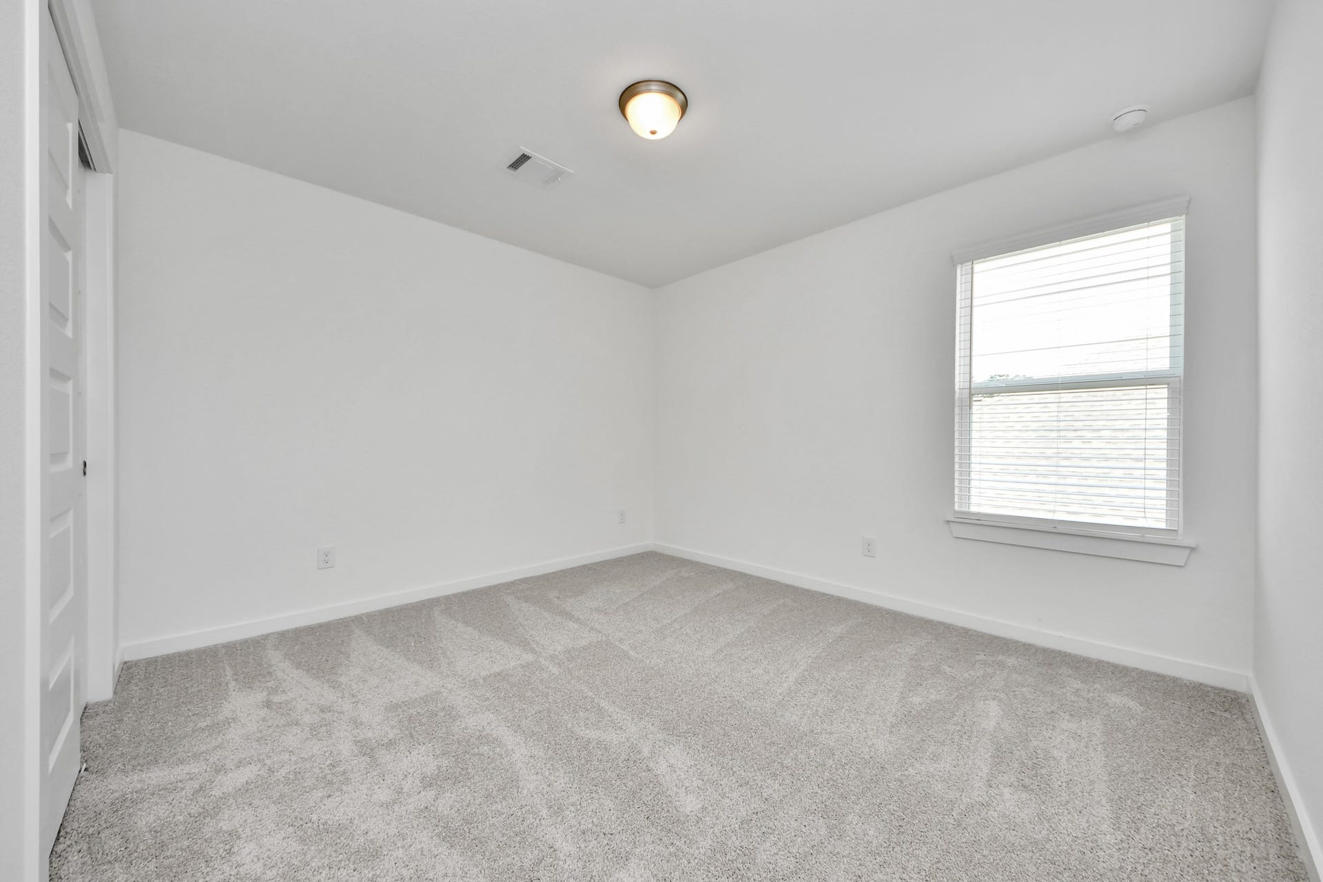 19046 Cape Capasso Drive, Hockley, TX 77447 Generously sized secondary bedrooms featuring spacious closets, soft and inviting carpeting underfoot, large windows allowing plenty of natural light, and the added touch of privacy blinds for your personal retreat. Sample photo of completed home with similar floor plan. Actual colors and selections may vary.