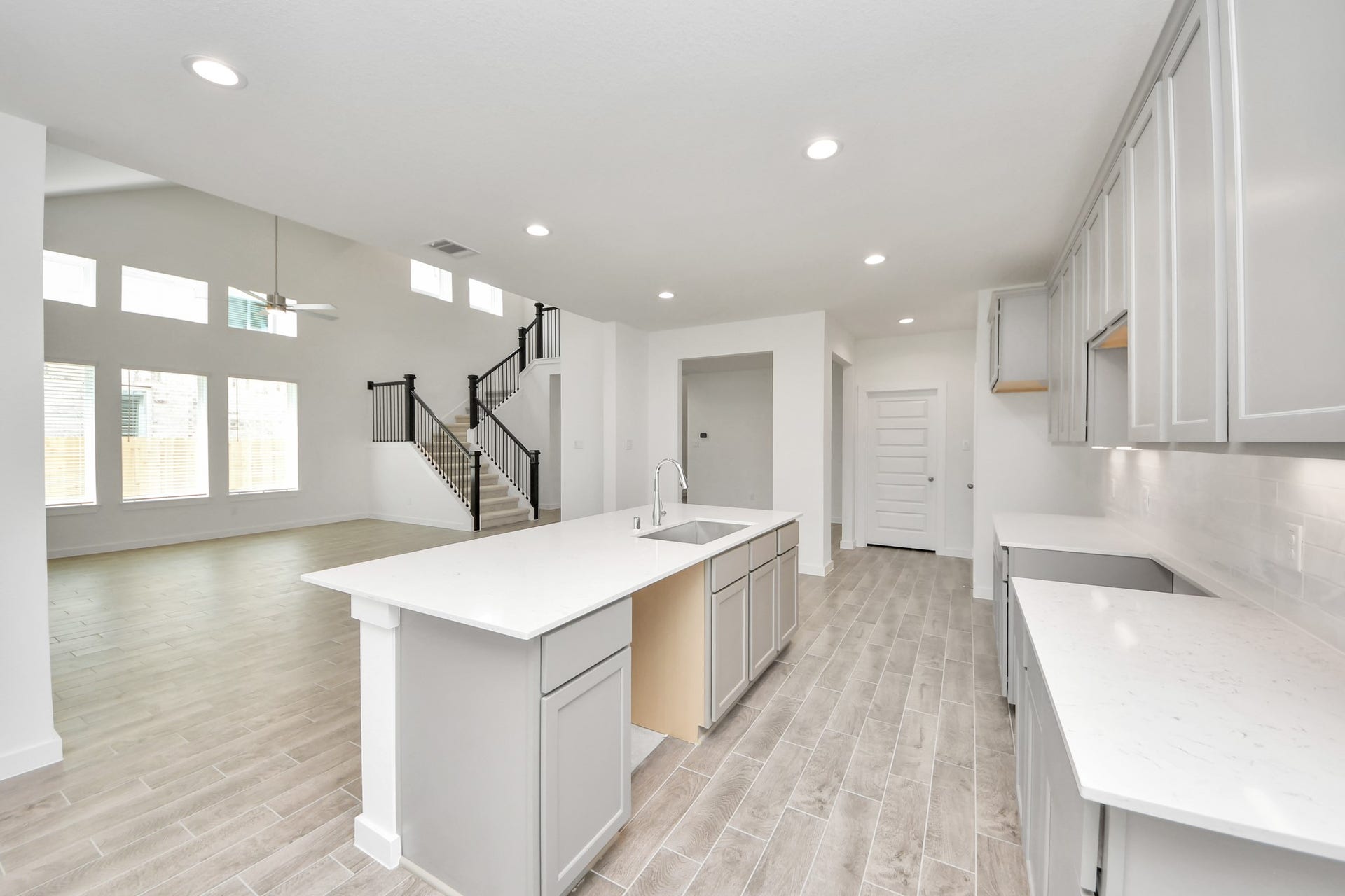 19046 Cape Capasso Drive, Hockley, TX 77447 All of this overlooks your expansive family room, creating a perfect space for culinary delights and family gatherings. Sample photo of completed home with similar floor plan. Actual colors and selections may vary.