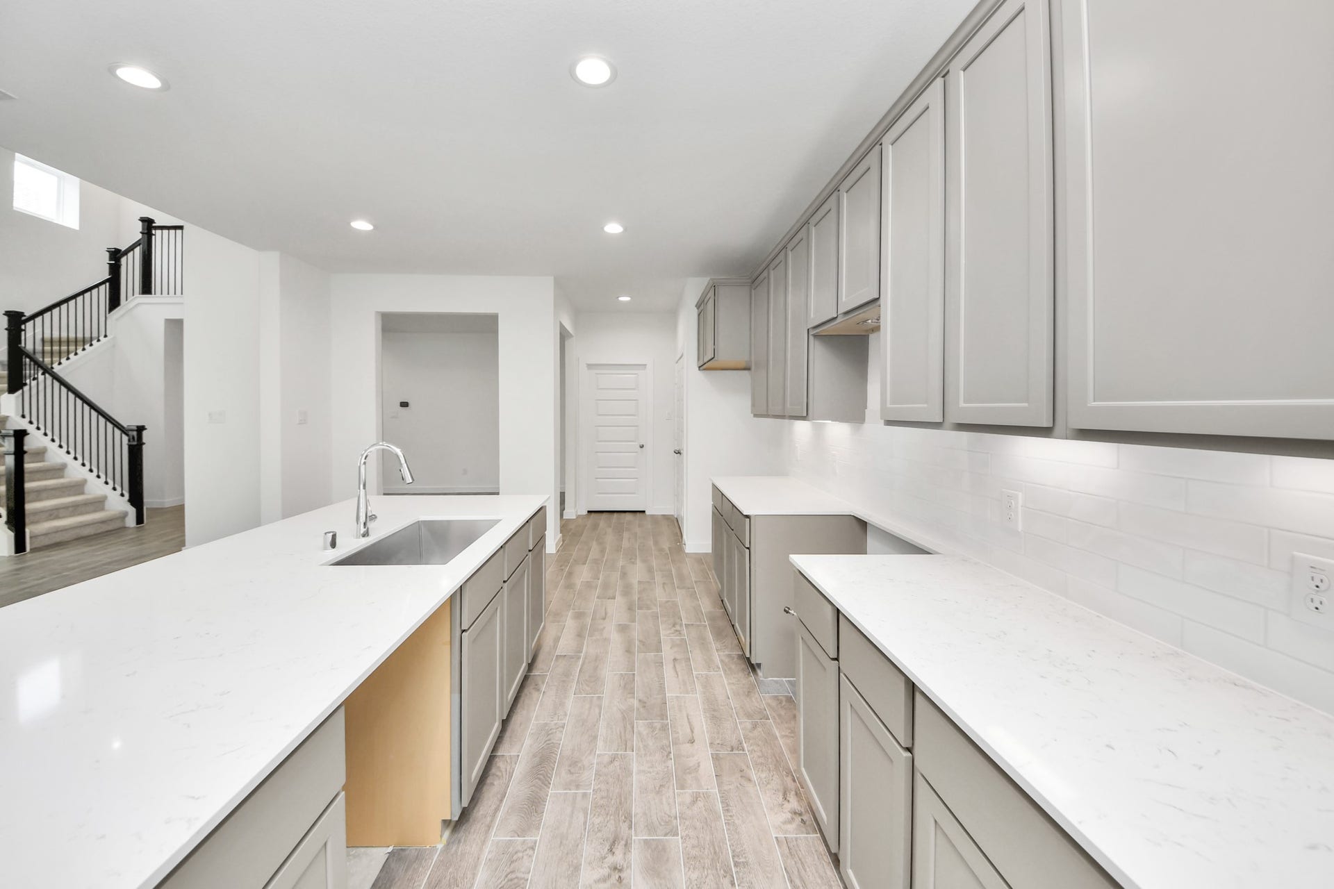 19046 Cape Capasso Drive, Hockley, TX 77447 This generously spacious kitchen is a dream realized! Sample photo of completed home with similar floor plan. Actual colors and selections may vary.