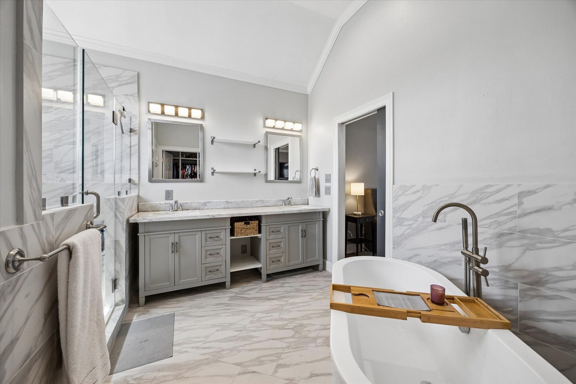 5111 Inker Street, #C, Houston, TX 77007 Primary suite spa bathroom includes dual vanity, walk in shower and soaking tub.