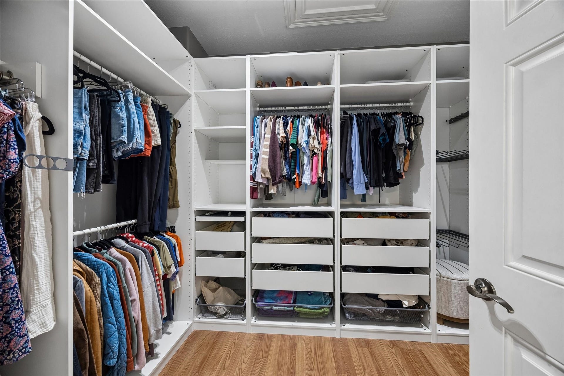 5111 Inker Street, #C, Houston, TX 77007 One of two closets in the primary suite. Plenty of organized space for all your wardrobe.