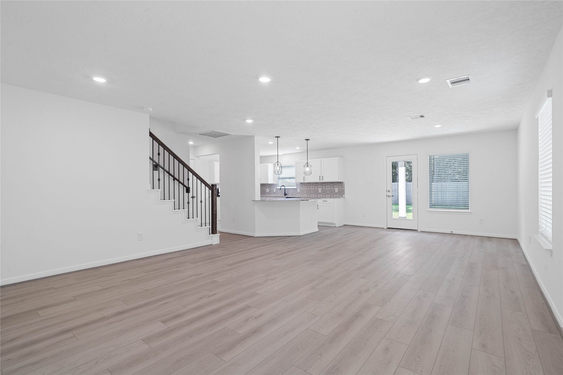10160 Maple Cove Lane, Willis, TX 77378 Welcome inside 10160 Maple Cove Lane! You are immediately drawn to the open concept living space and the warm toned vinyl plank flooring!