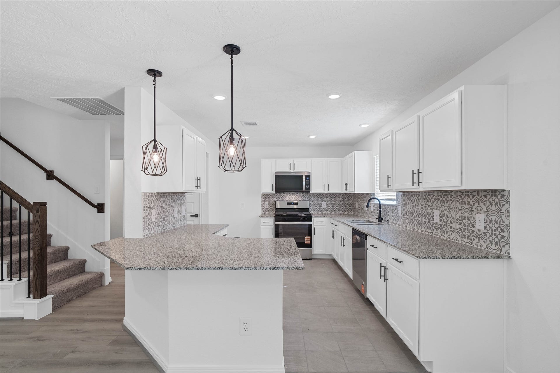10160 Maple Cove Lane, Willis, TX 77378 This spacious kitchen has it allample storage, generous counter space, and a layout that truly makes it the heart of the home.