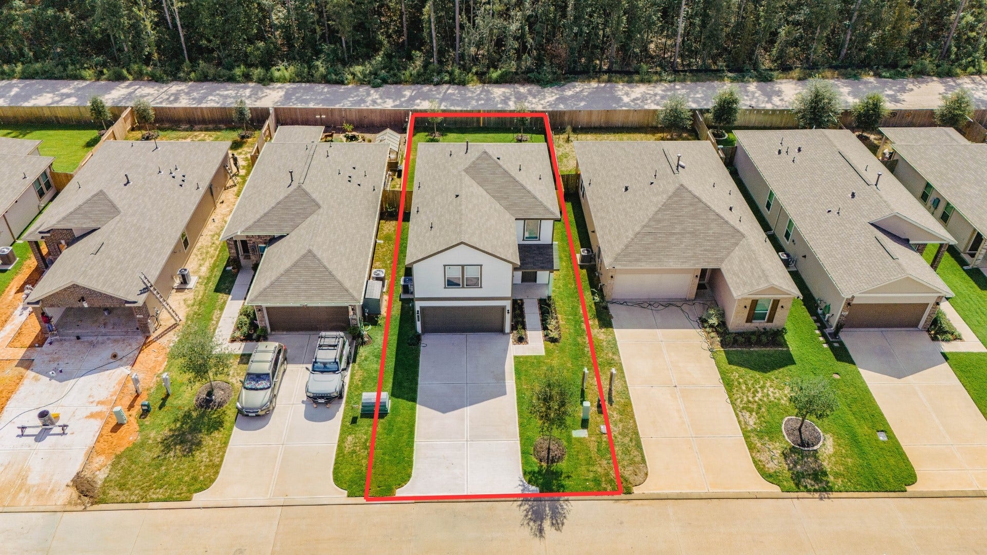 10160 Maple Cove Lane, Willis, TX 77378 This aerial shot showcases the placement of this gorgeous home, which sits on a lot with NO BACK NEIGHBORS, ample yard space in front and the back, lush landscaping and well-maintained yard!