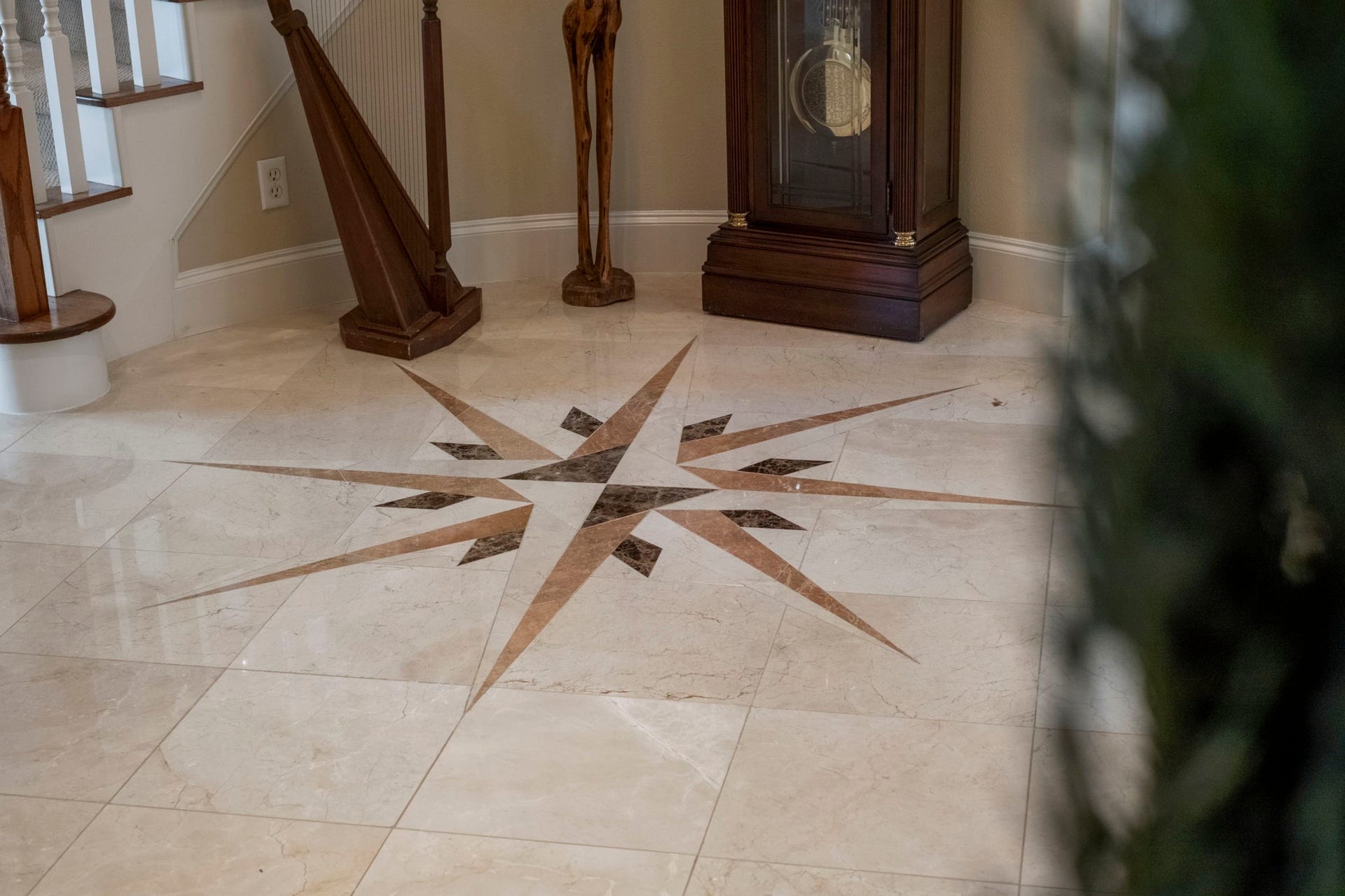 7 Silverloch Court, Sugar Land, TX 77479 Elegant foyer featuring a stunning marble inlay Compass Rose design on the floor with matching design on dome ceiling.