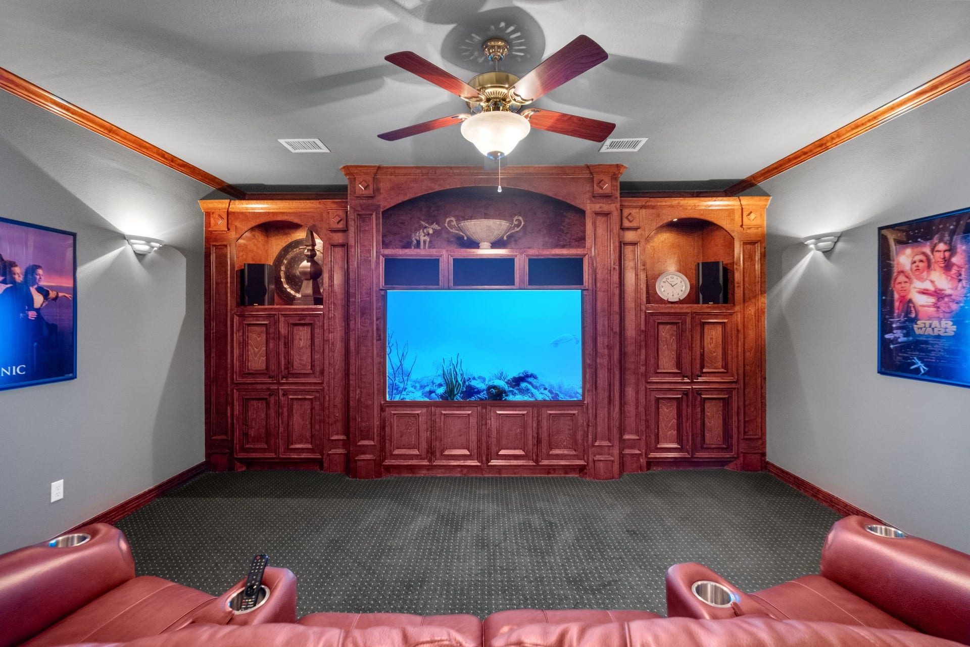 7 Silverloch Court, Sugar Land, TX 77479 Magnificent home theater with rich wood cabinetry, and space for a large screen, creating the perfect space for movie nights.