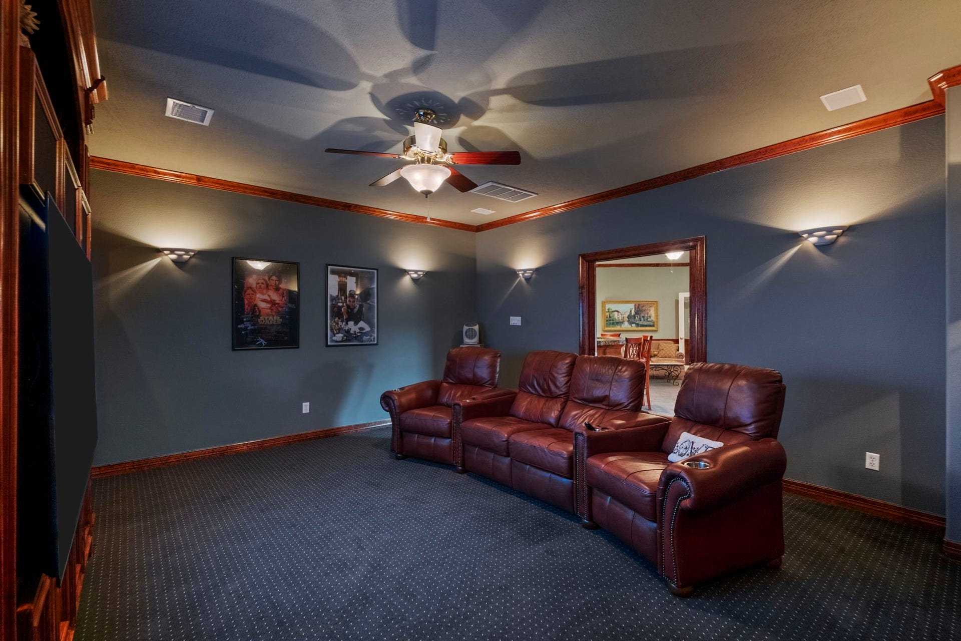 7 Silverloch Court, Sugar Land, TX 77479 Surround sound and elegant lighting makes movie nights here phenomenal.