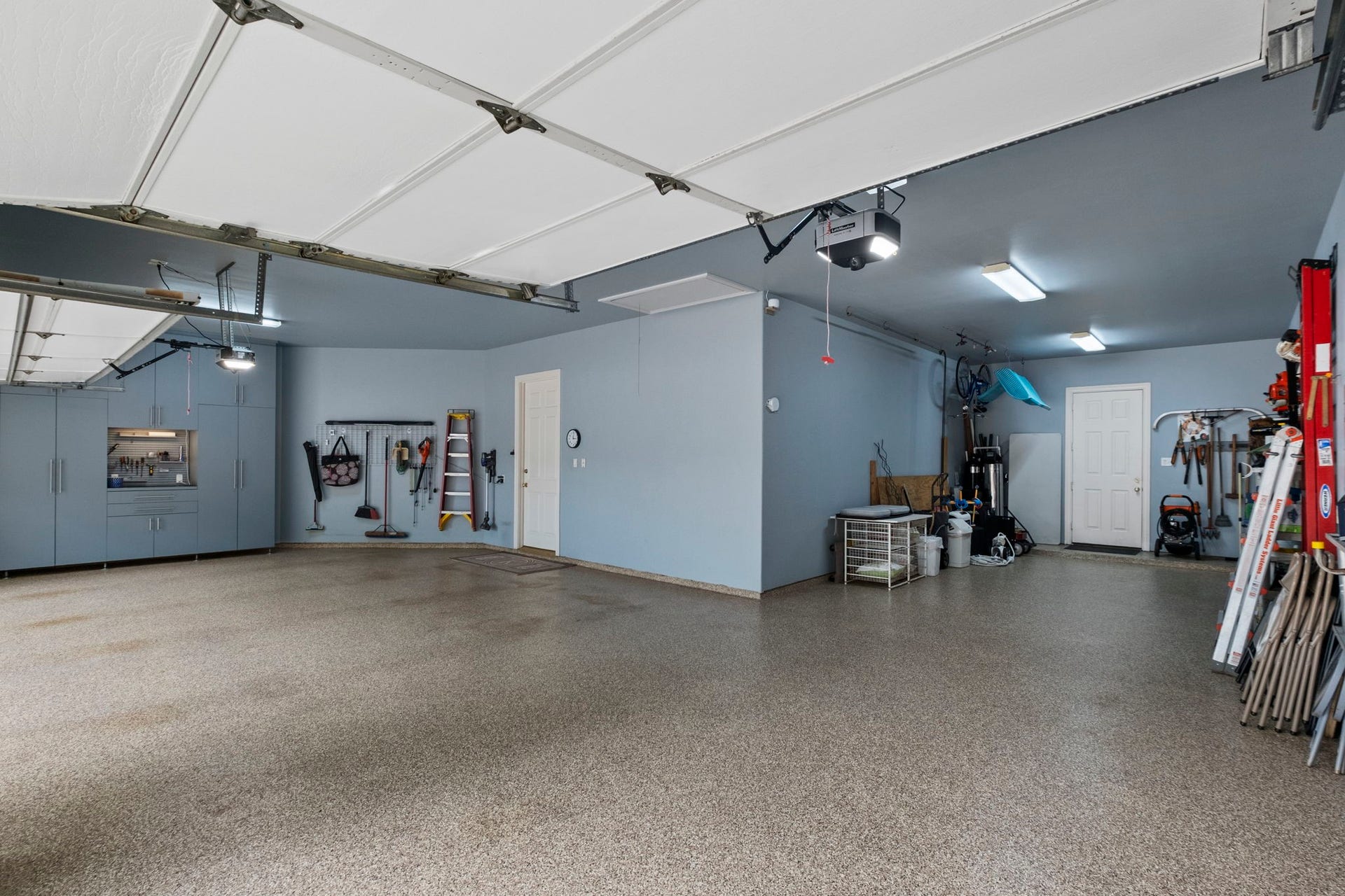 7 Silverloch Court, Sugar Land, TX 77479 Everyone's Dream!! A 4 and 1/2 car garage with abundant built in storage