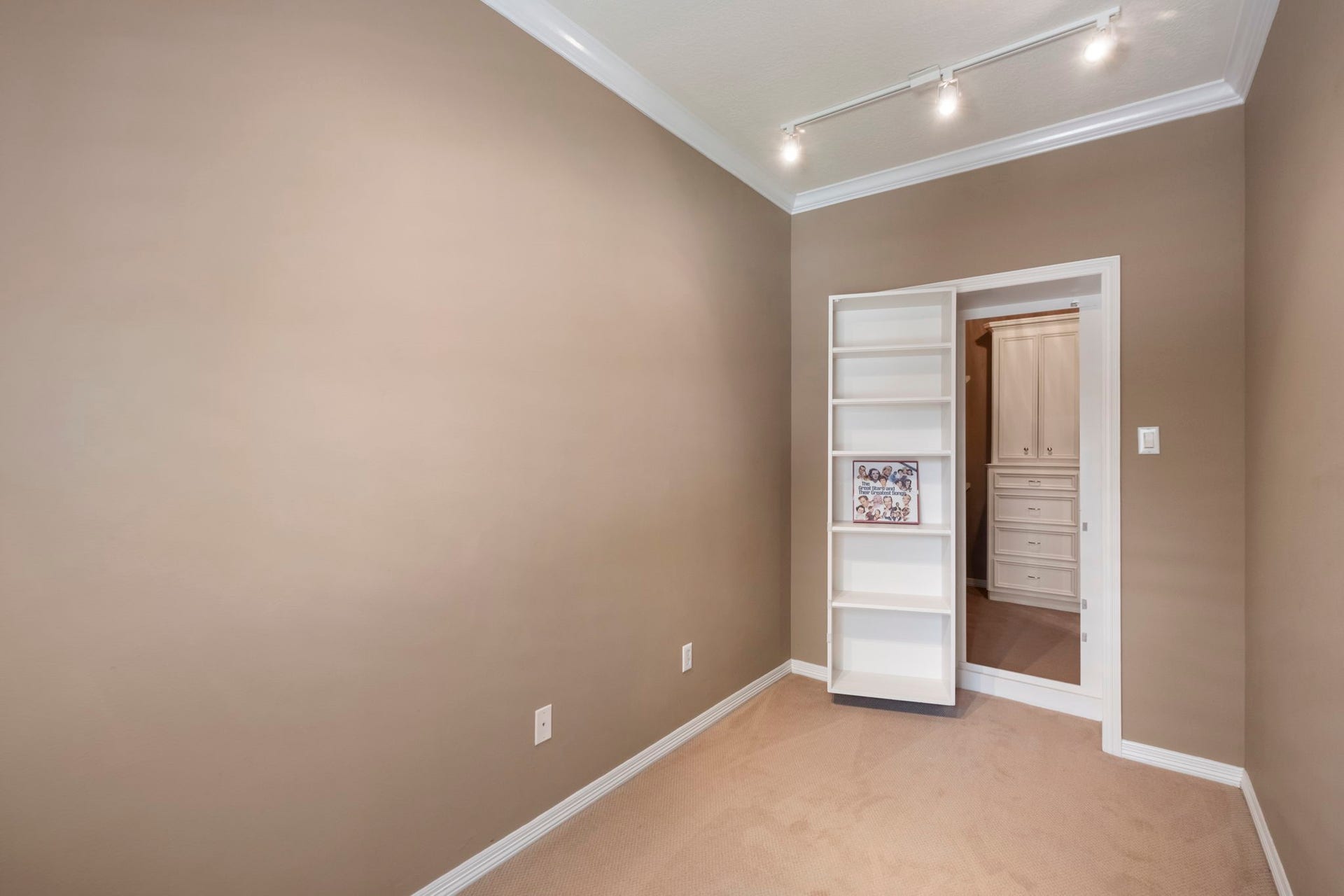 7 Silverloch Court, Sugar Land, TX 77479 Secret room hidden behind shelving in closet. Perfect for beginners learning musical instruments, a quiet reading room or just storage.