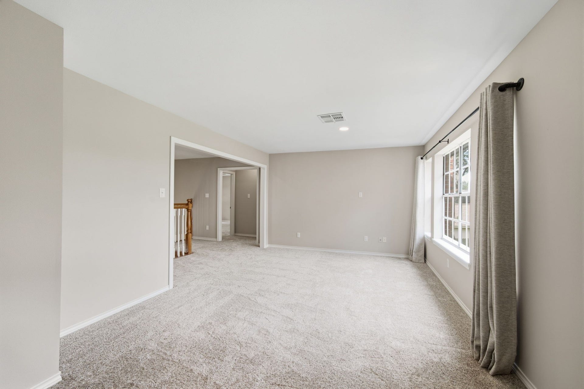 New carpet on the second floor opens to an additional family room giving the home another substantial gathering space.