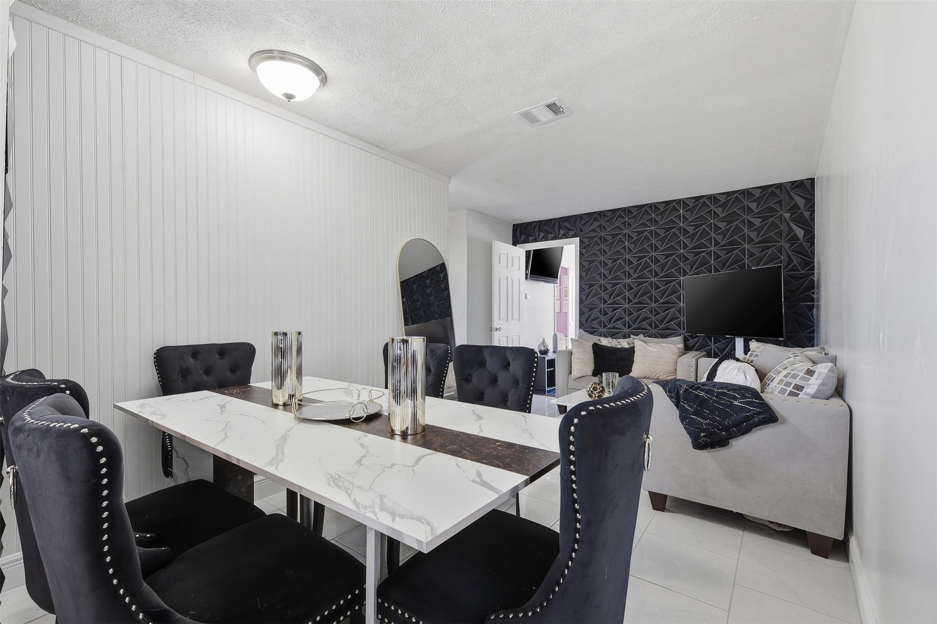 2205 Strawberry Road, Pasadena, TX 77502 Private rear living/dining area offering comfortable residential space separate from the front commercial portion of the property.