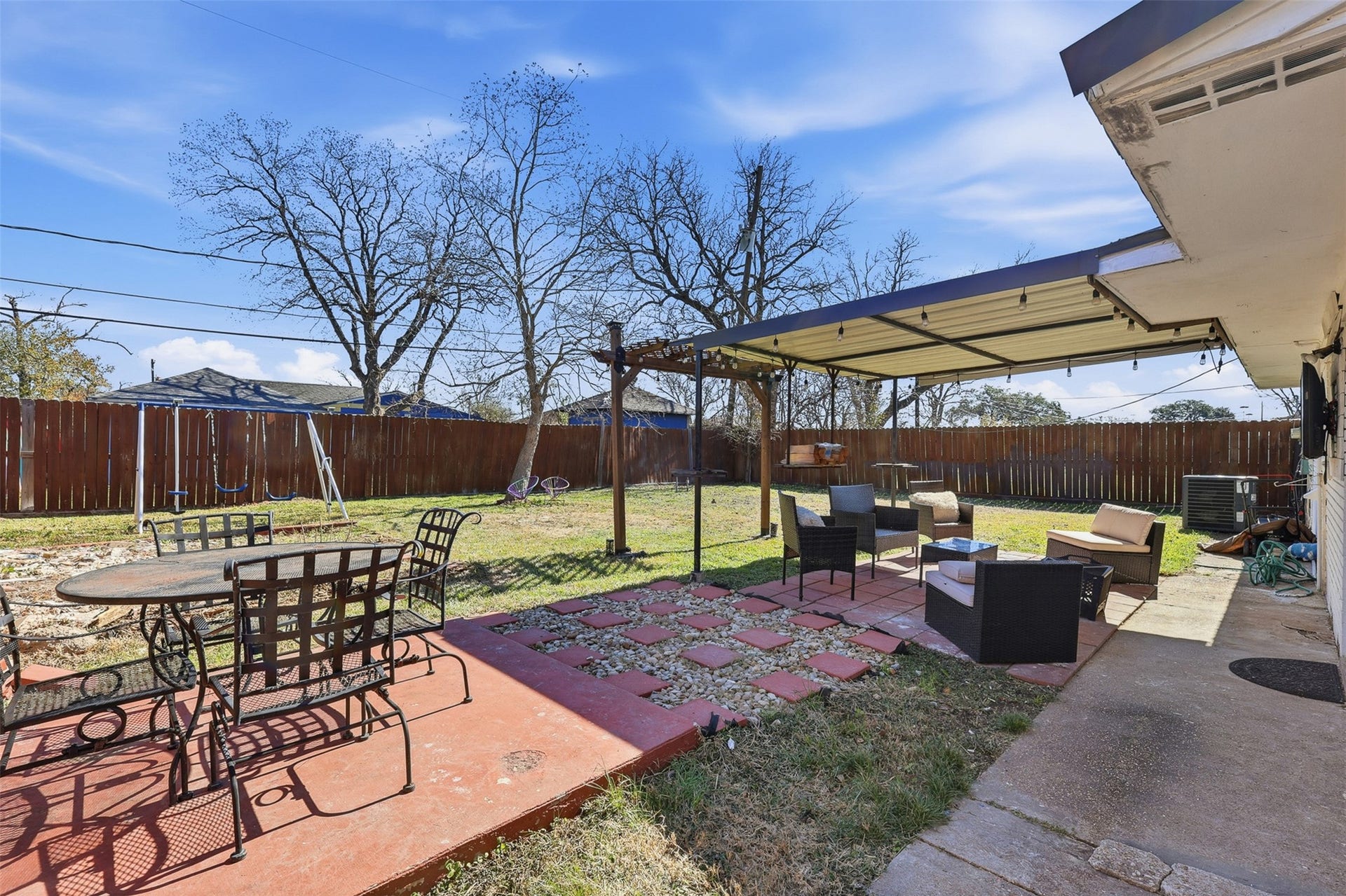 2205 Strawberry Road, Pasadena, TX 77502 Spacious backyard area can be converted into additional parking space if needed. Backyard access available via side driveway.