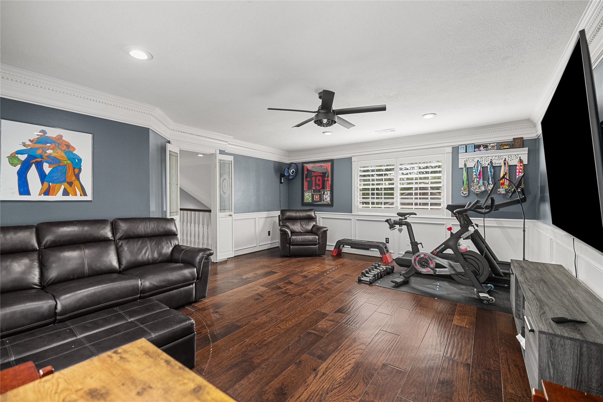 Another view of the spacious game room, offering flexible space for a media room, fitness area, or entertainment retreat.