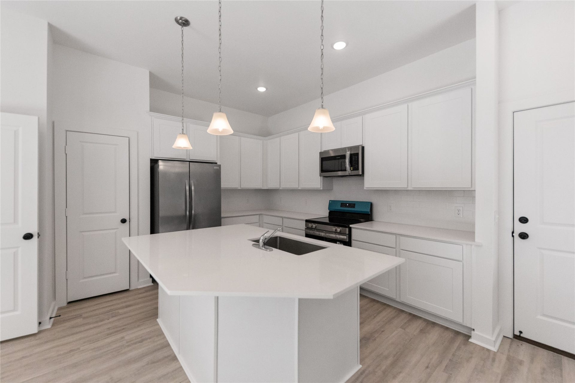 3326 Anita, #B, Houston, TX 77004 Kitchen with white quartz countertops