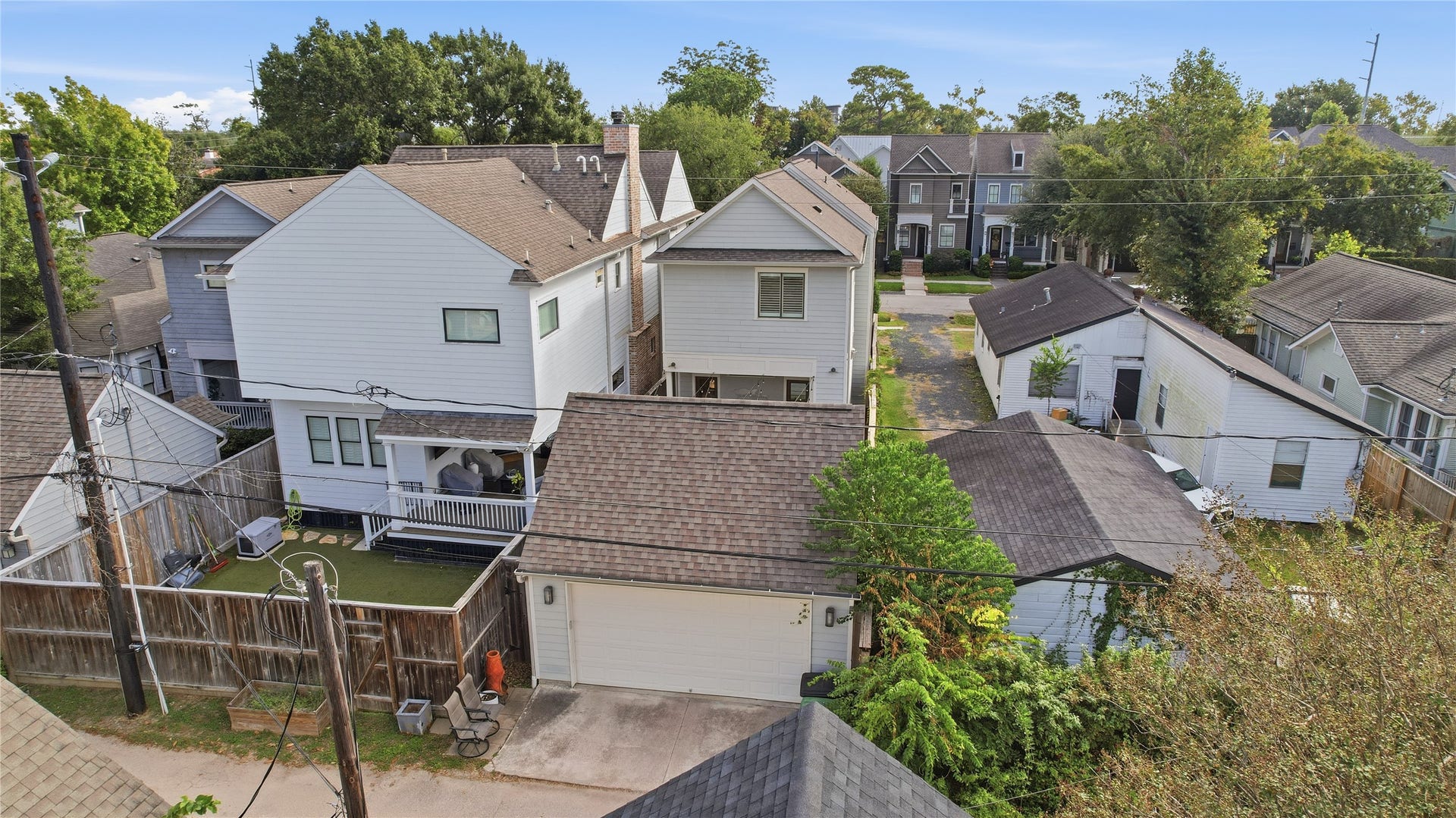 813 Ashland Street, Houston, TX 77007 Detached two-car garage provides secure parking and additional storage, with convenient rear alley access.
