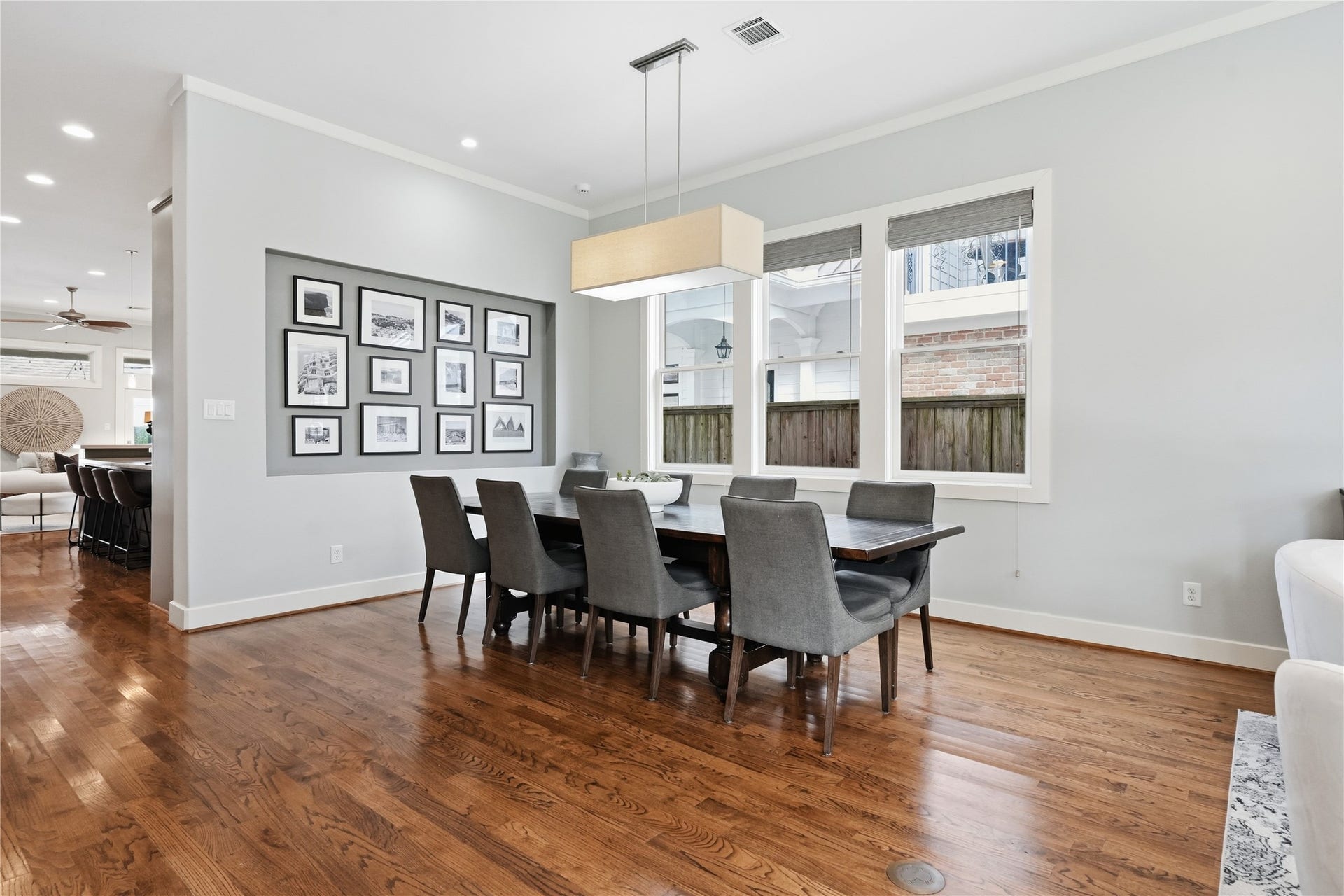 813 Ashland Street, Houston, TX 77007 Spacious dining area offers ample seating and seamless flow to the kitchen and living spaces, making entertaining effortless.