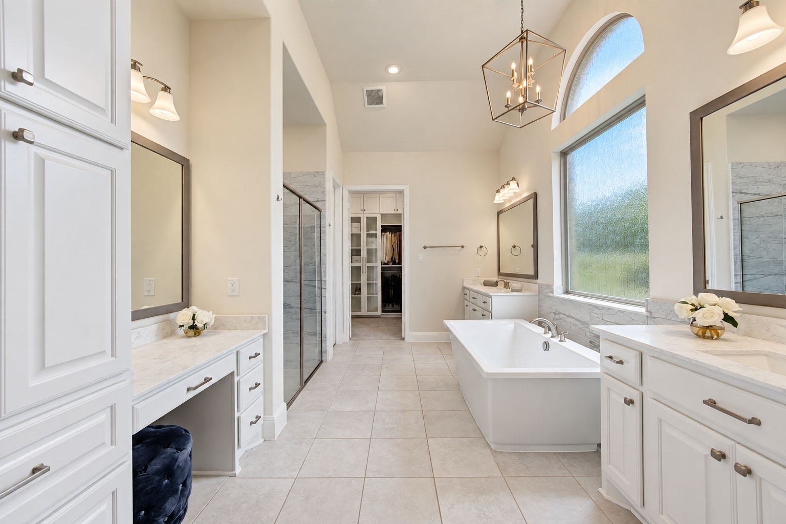 2803 Enriched Enclave Court, Richmond, TX 77406 Spa-inspired primary bath with a freestanding soaking tub, dual vanities, oversized shower, and soaring ceiling with abundant natural light.