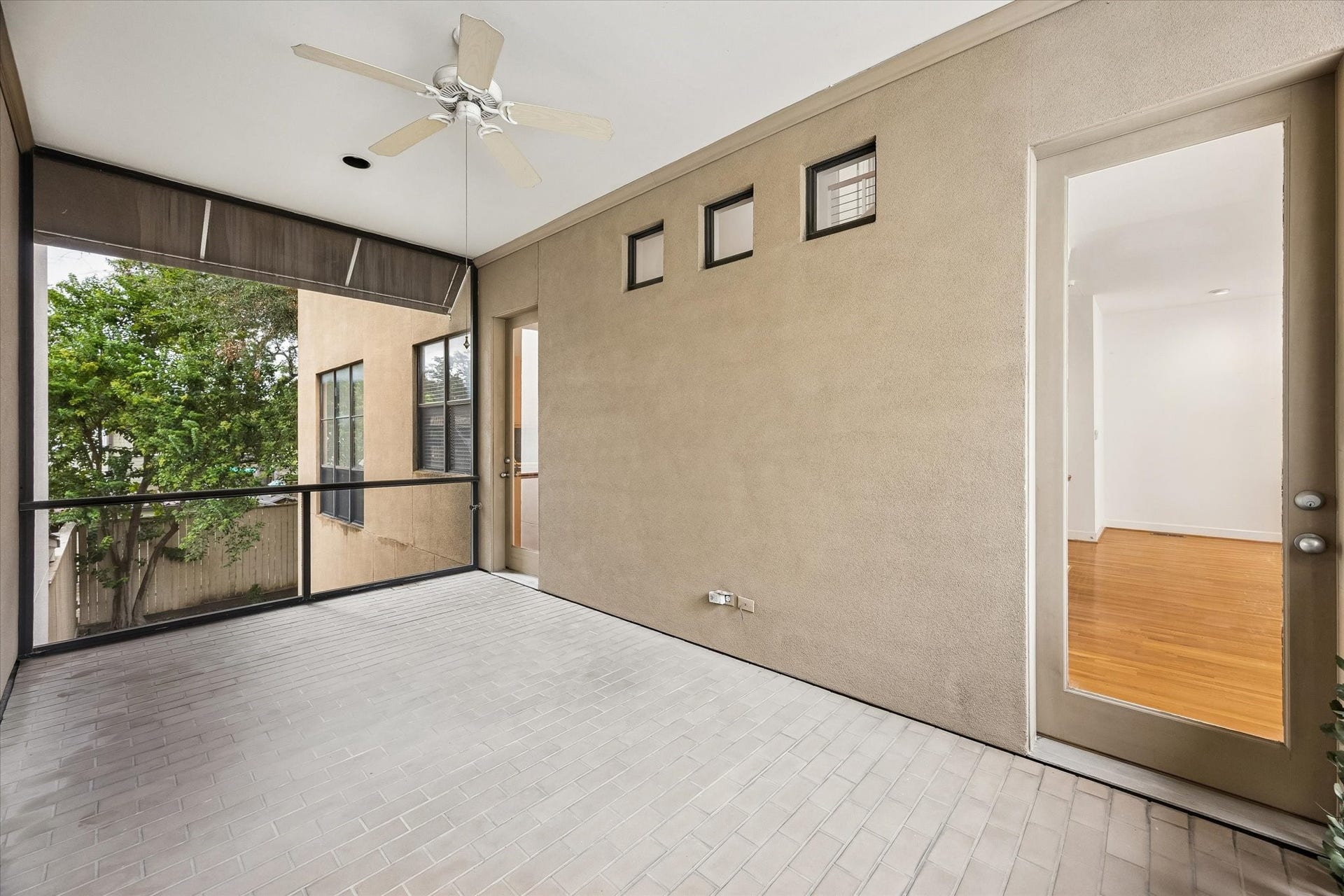 ANOTHER VIEW OF THE BREEZEWAY BALCONY THAT IS OFF FROM THE KITCHEN AND LIVING ROOM.  BRING THE OUTSIDE IN... SO NICE.