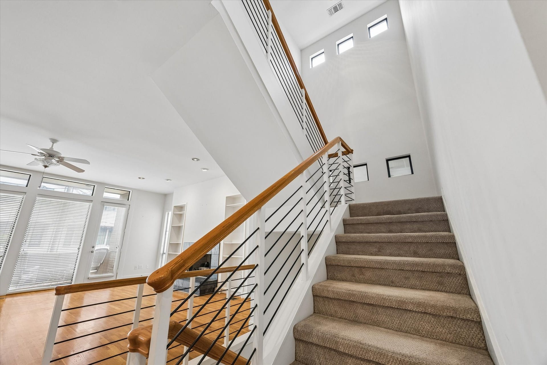 ARCHITECTURAL DESIGN IS SO ATTRACTIVE AND ENJOYABLE TO THE EYES.  UPSTAIRS TO THE MASSIVE PRIMARY SUITE AND GUEST BEDROOM.